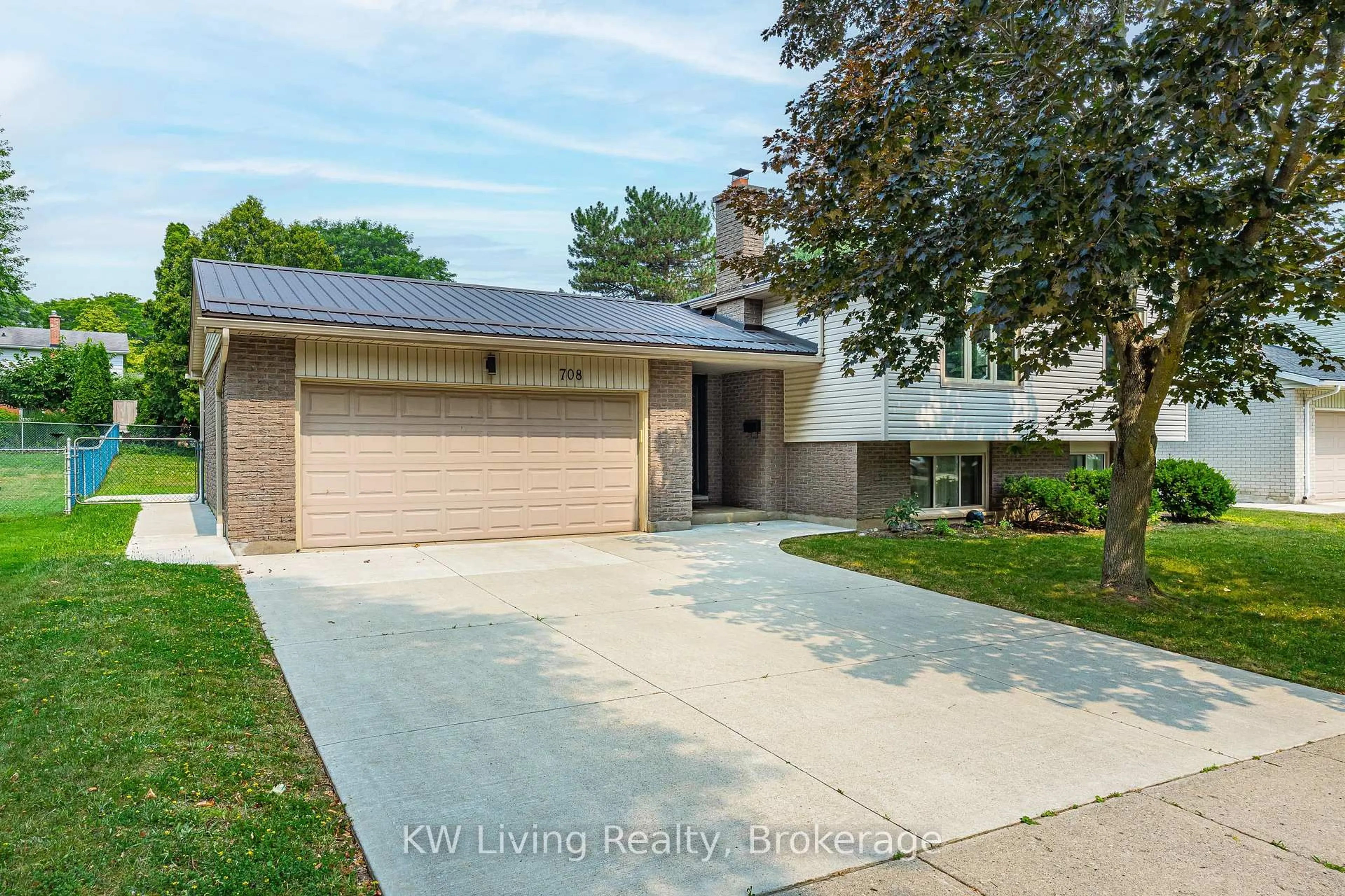 Home with brick exterior material, street for 708 VILLAGE GREEN Ave, London South Ontario N6K 1H2