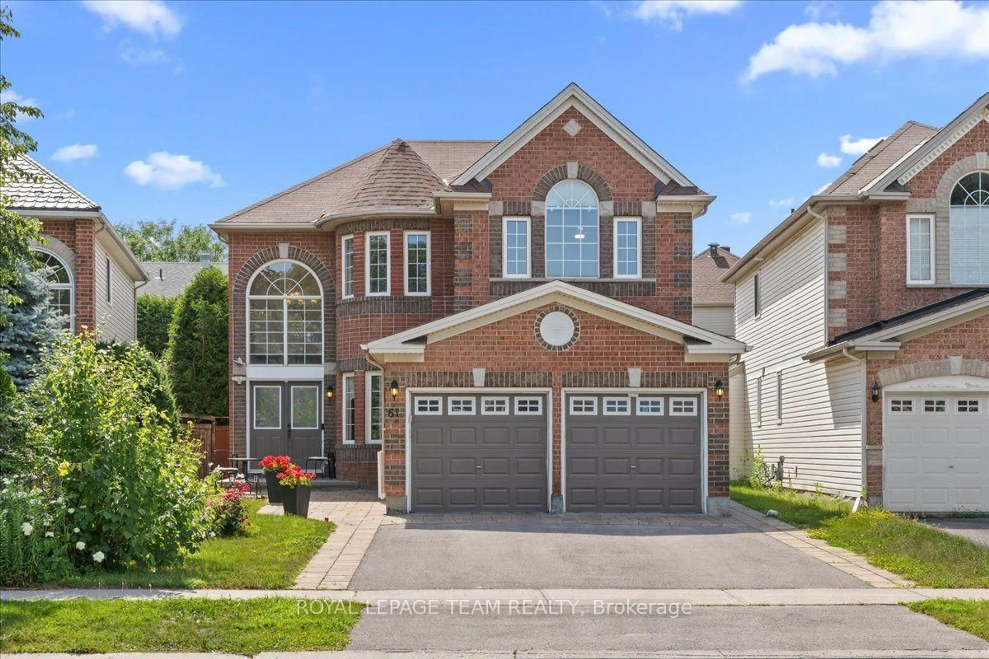 Home with brick exterior material, street for 61 Shirley's Brook Dr, Ottawa Ontario K2K 3M8