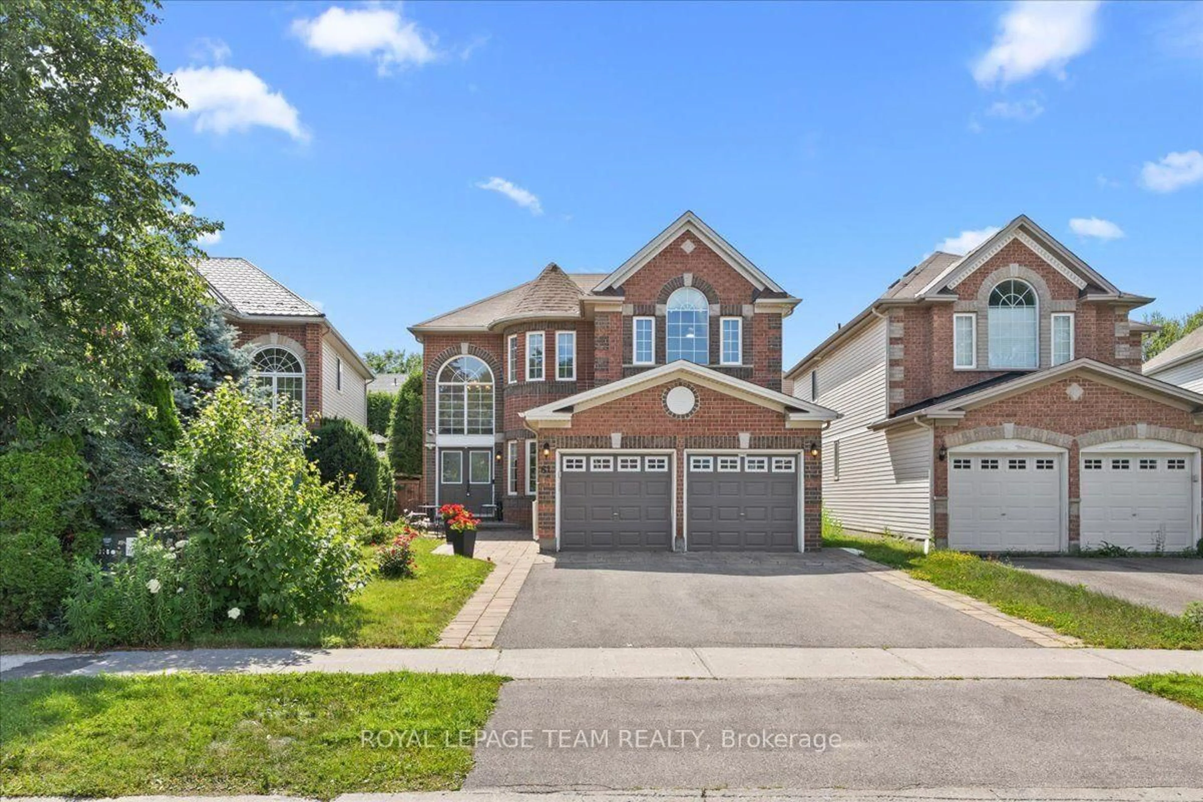 Home with brick exterior material, street for 61 Shirley's Brook Dr, Ottawa Ontario K2K 3M8