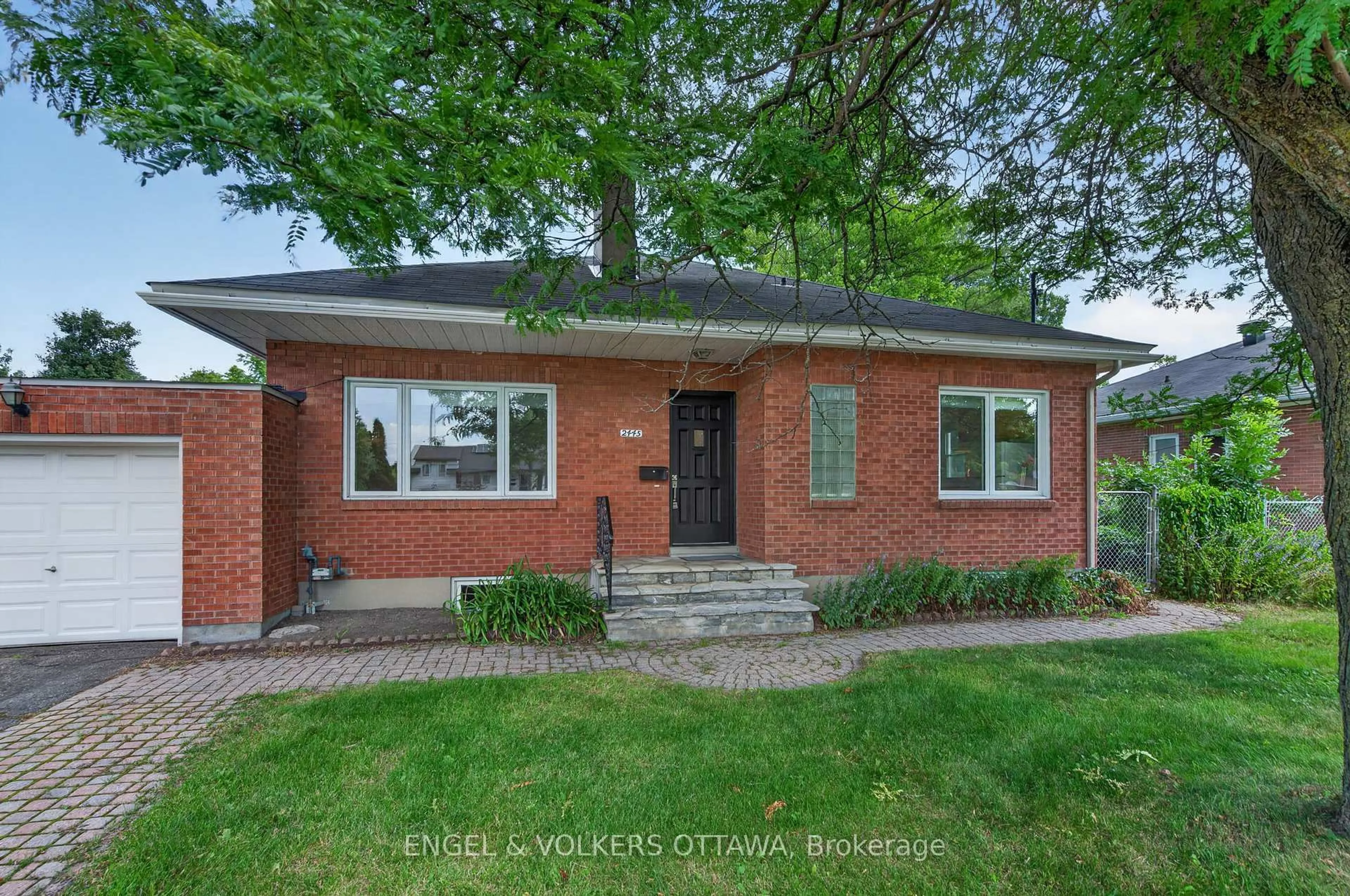 Home with brick exterior material, street for 2445 Alta Vista Dr, Ottawa Ontario K1H 7M9