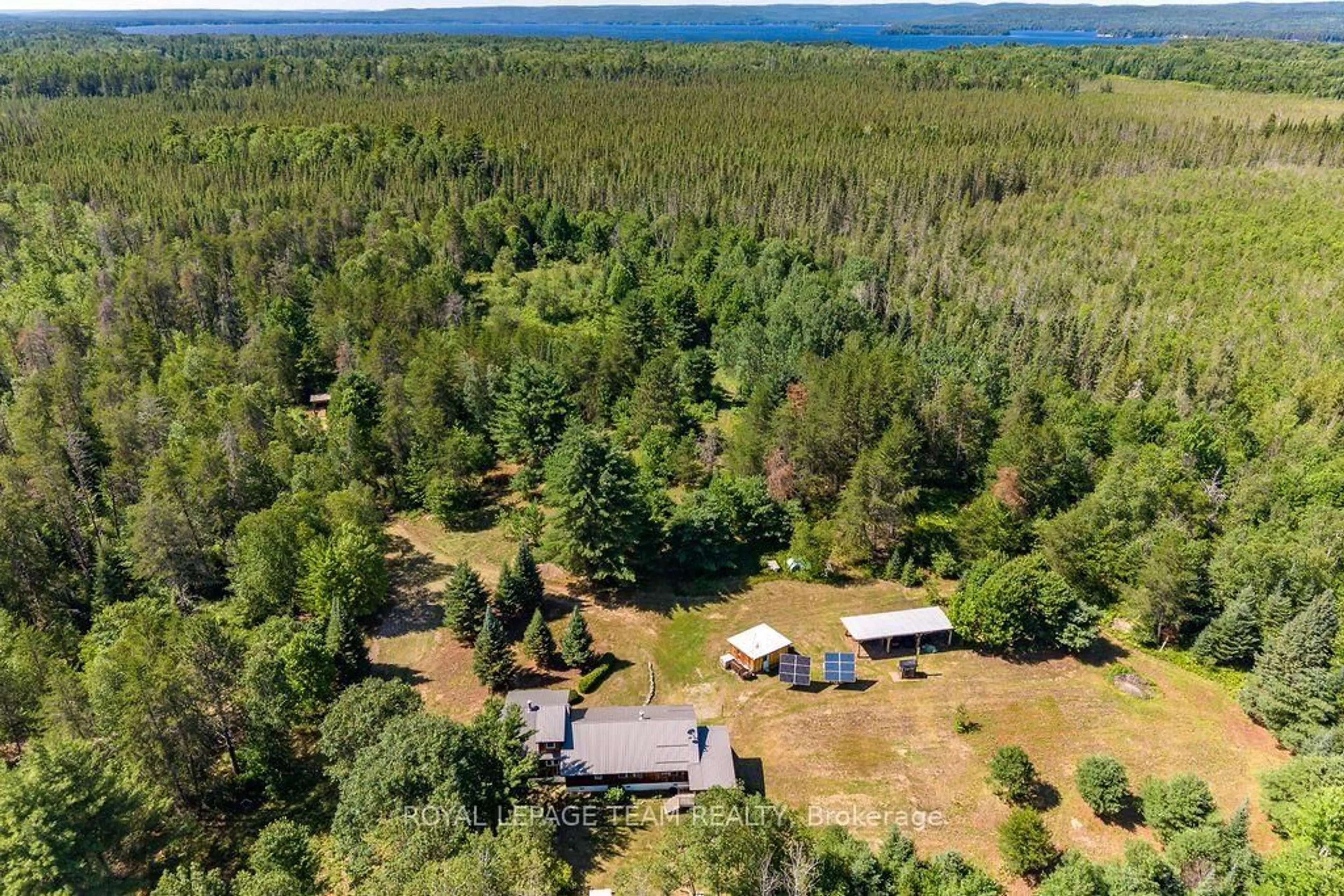 A pic from outside/outdoor area/front of a property/back of a property/a pic from drone, forest/trees view for 1790 Simpson Pit Rd, Round Lake Centre Ontario K0J 2J0