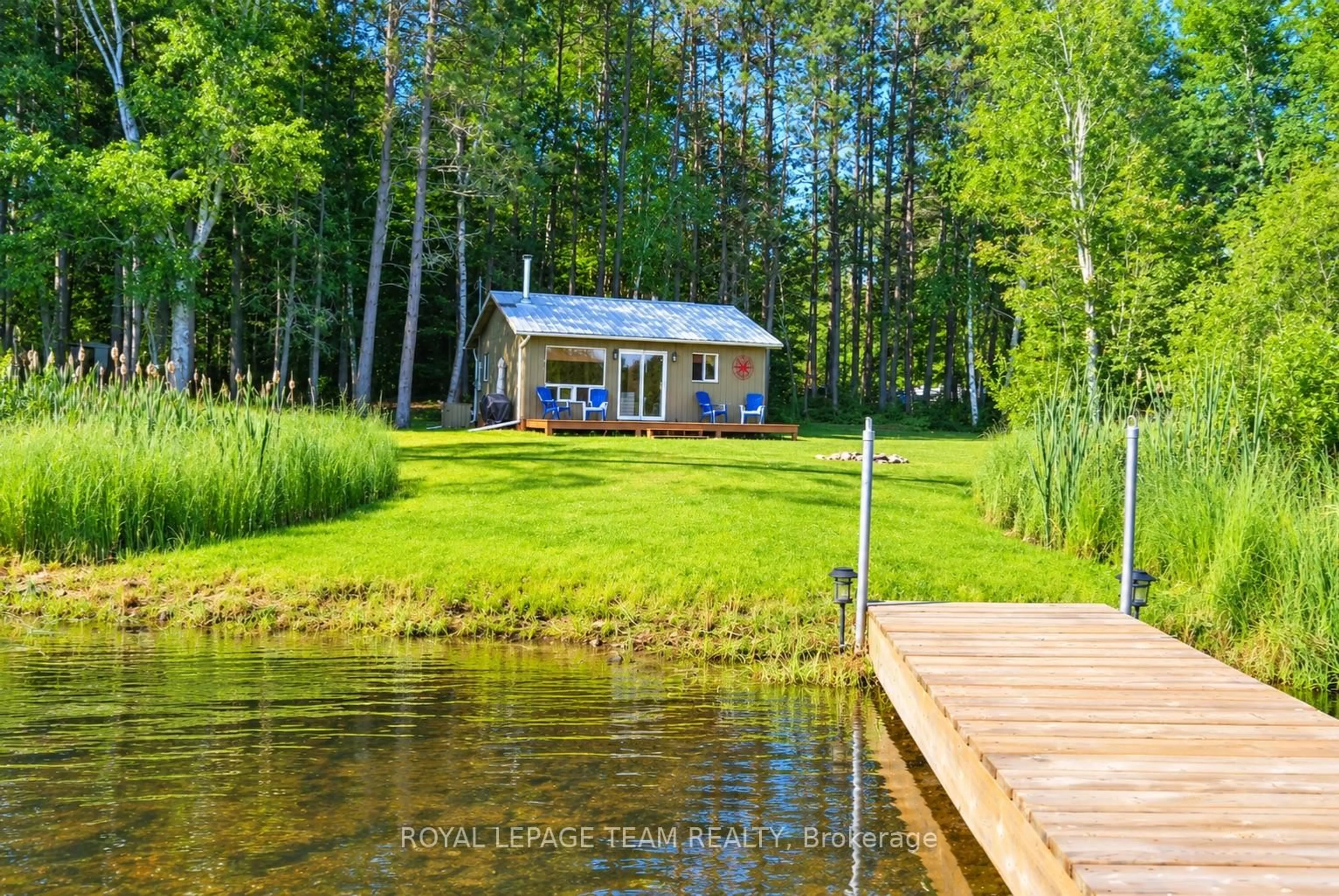 A pic from outside/outdoor area/front of a property/back of a property/a pic from drone, water/lake/river/ocean view for 28 Beas Lane, Eganville Ontario K0J 1T0