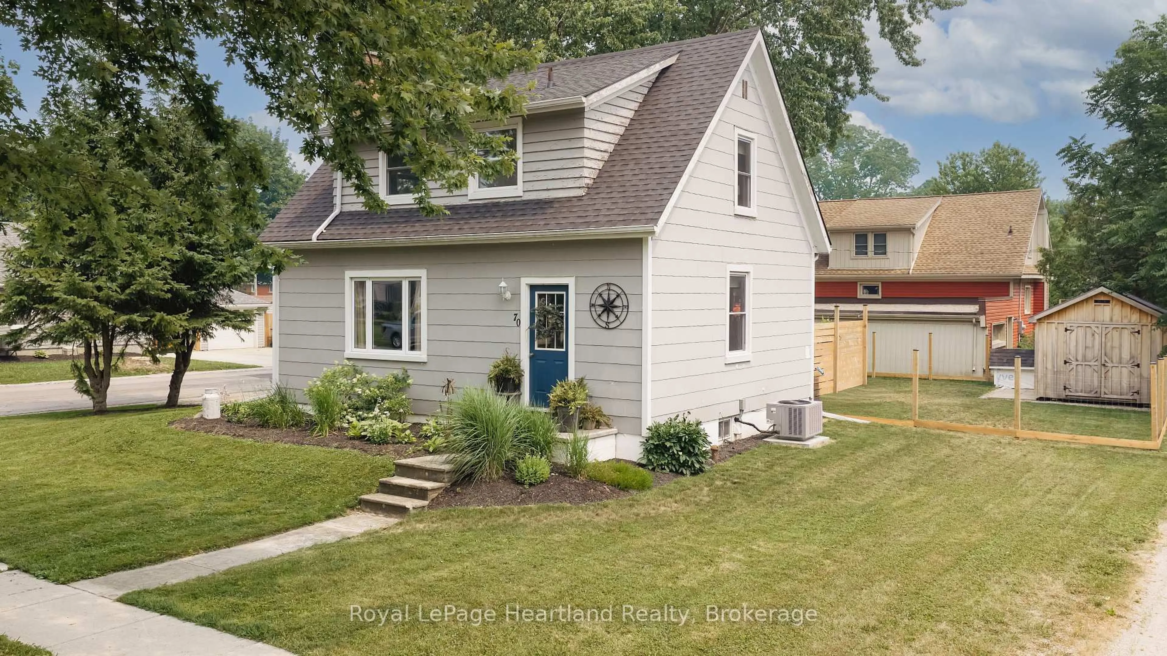 Home with vinyl exterior material, street for 70 Main St, Huron East Ontario N0K 1W0