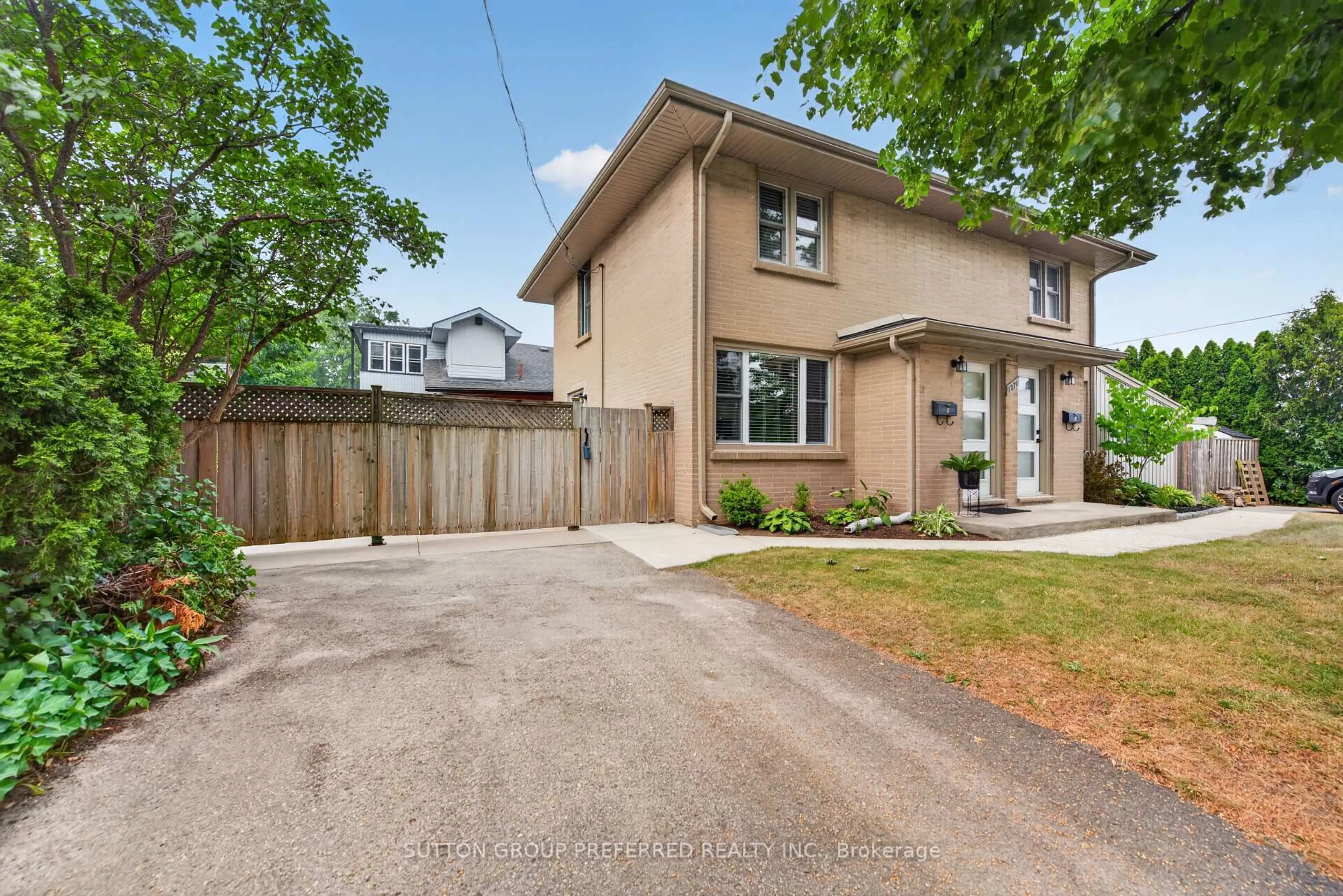 Home with brick exterior material, street for 1271 Norman (Unit B) Ave, London South Ontario N6K 2A1