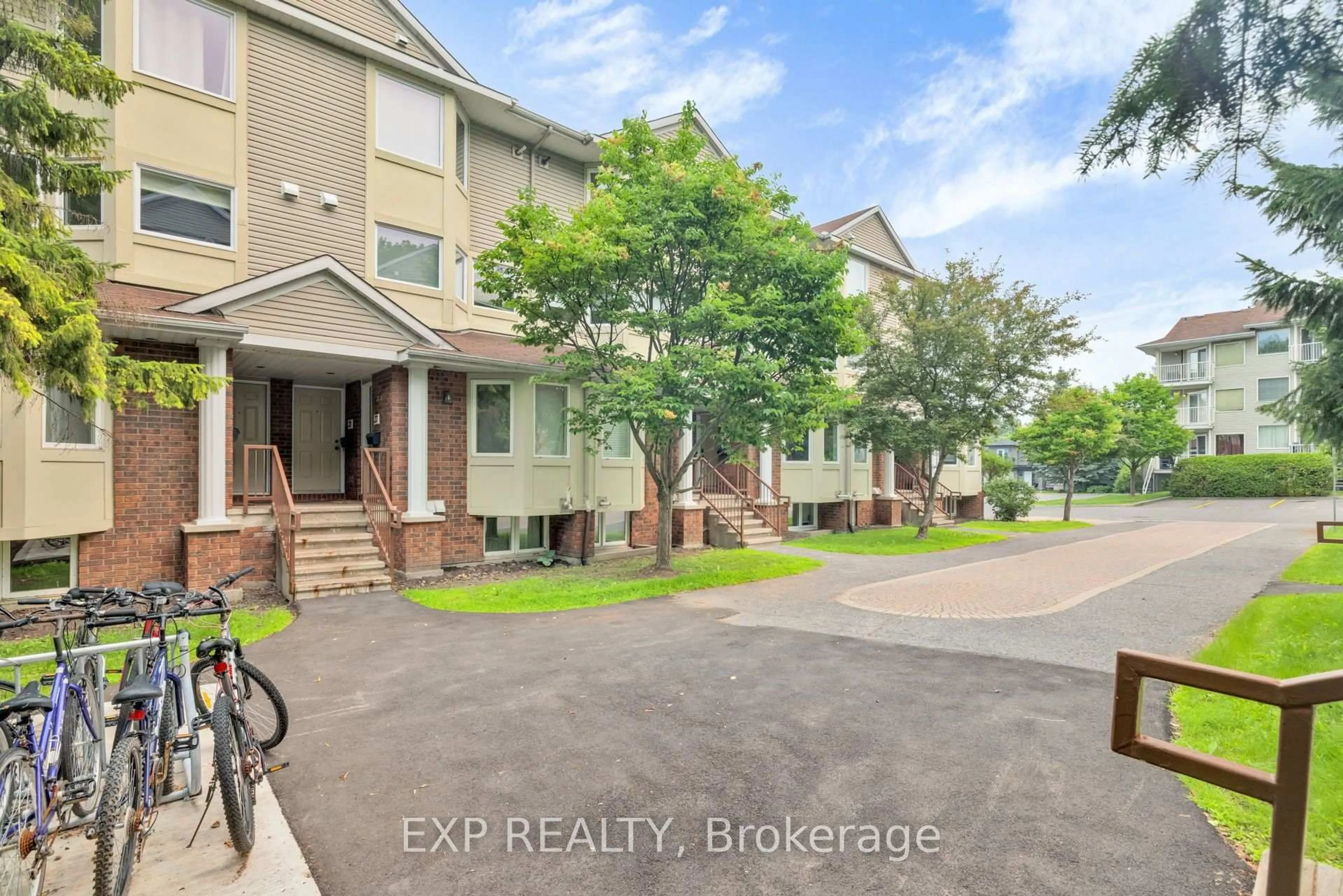 A pic from outside/outdoor area/front of a property/back of a property/a pic from drone, street for 1400 WILDBERRY Crt #30, Ottawa Ontario K1C 7K6