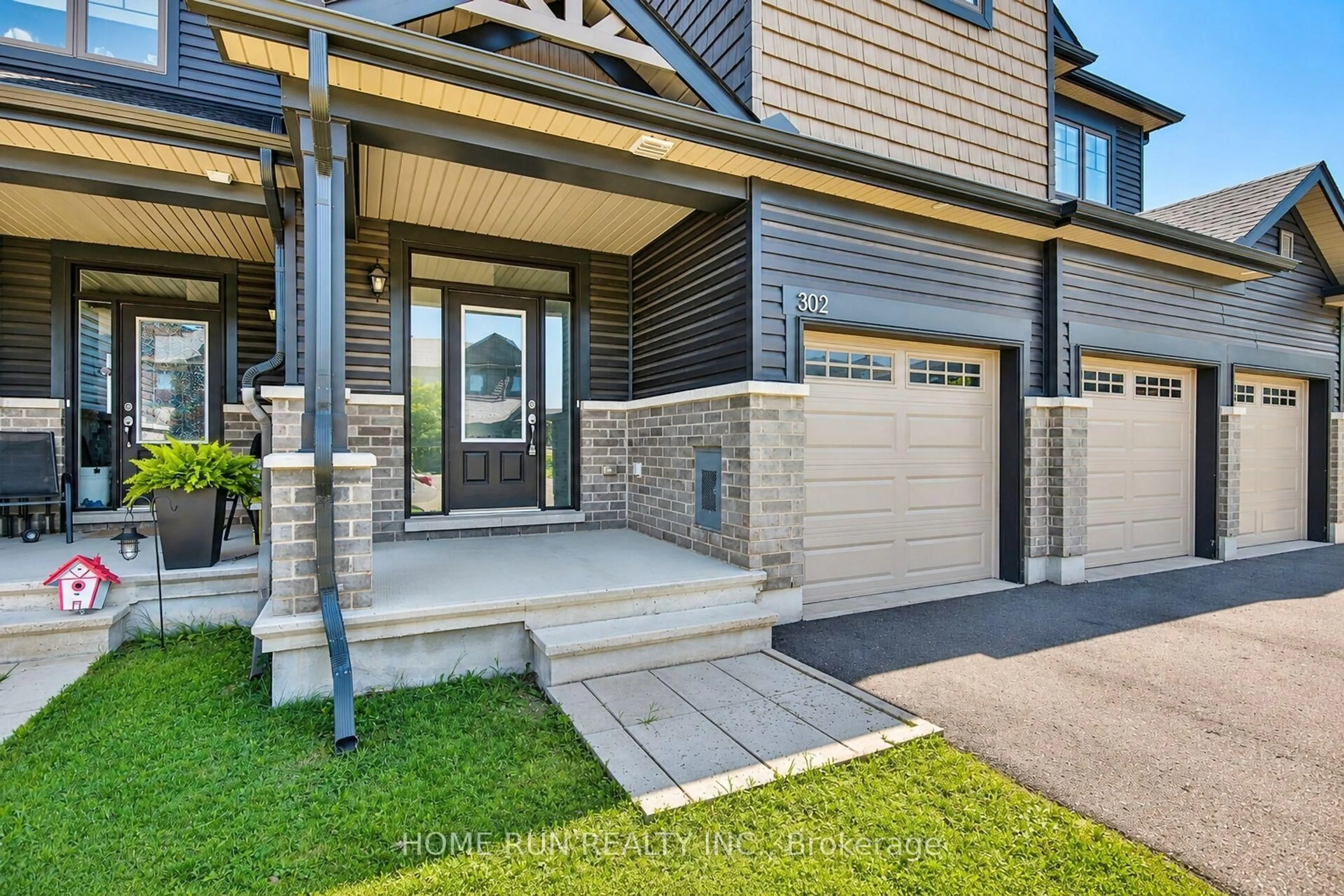 Home with brick exterior material, street for 302 Grackle St, Ottawa Ontario K1X 0G7