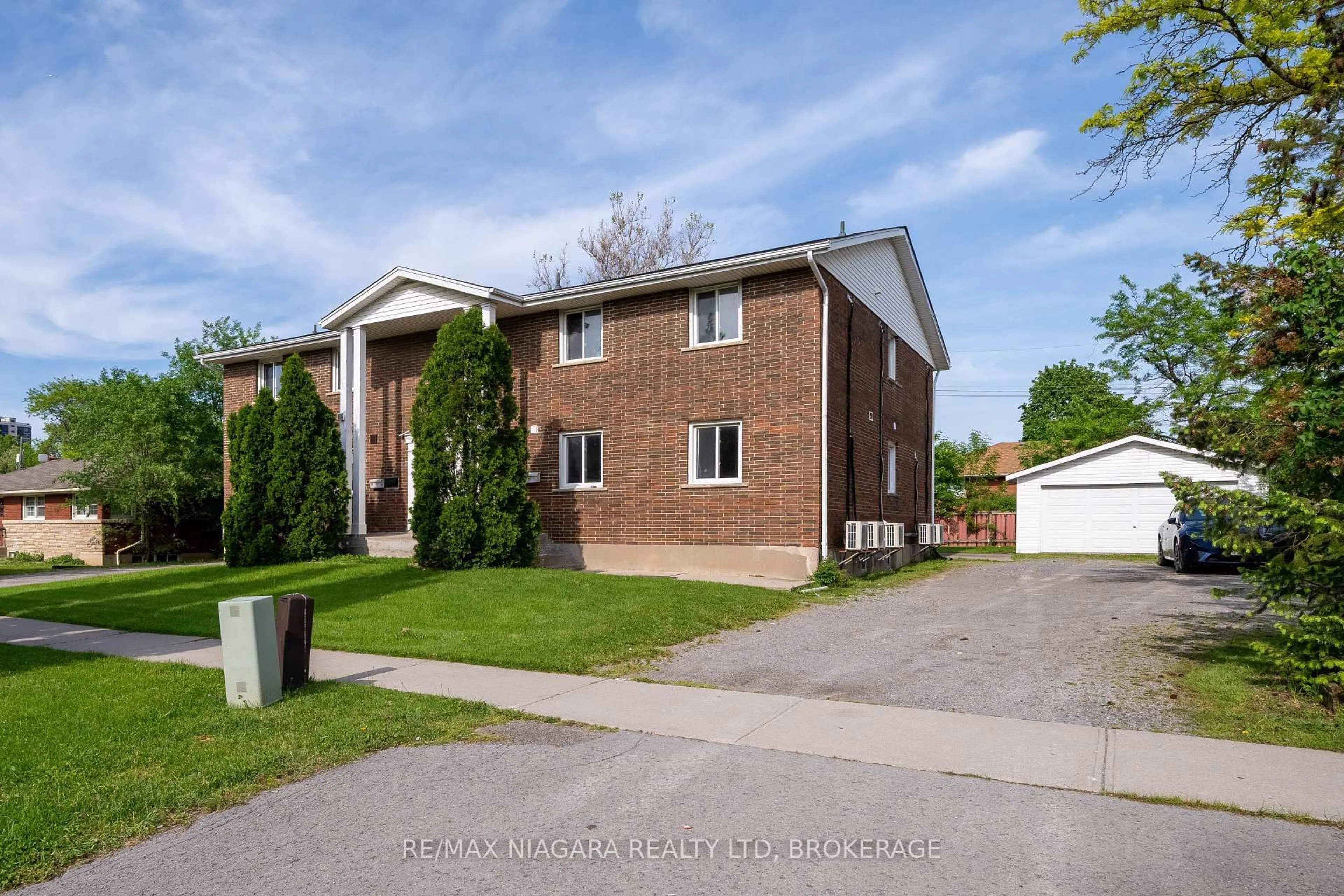 Home with brick exterior material, street for 293-295 Glenridge Ave, St. Catharines Ontario L2T 3K5