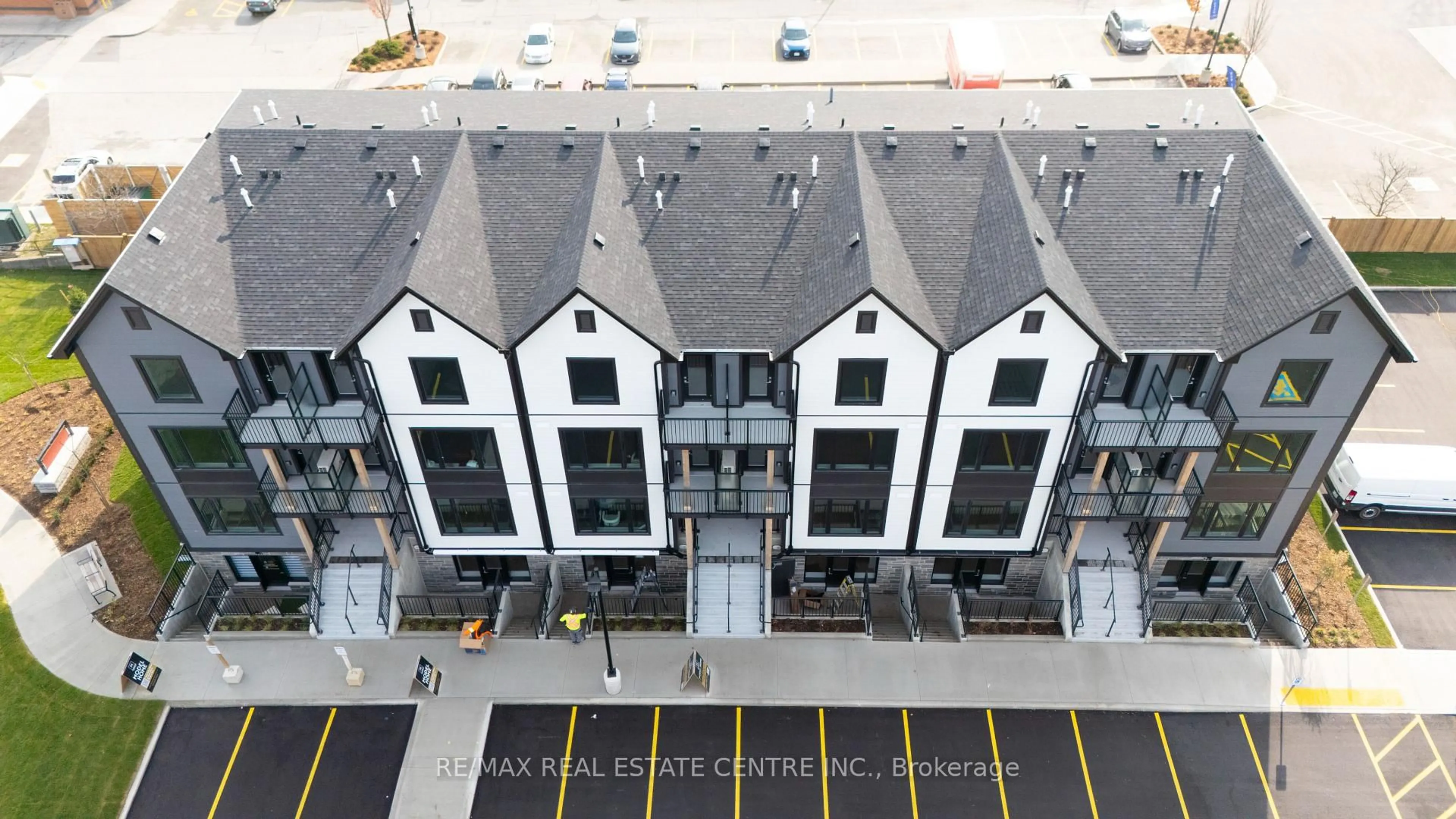 A pic from outside/outdoor area/front of a property/back of a property/a pic from drone, street for 708 Woolwich St #117, Guelph Ontario N1H 3Z1