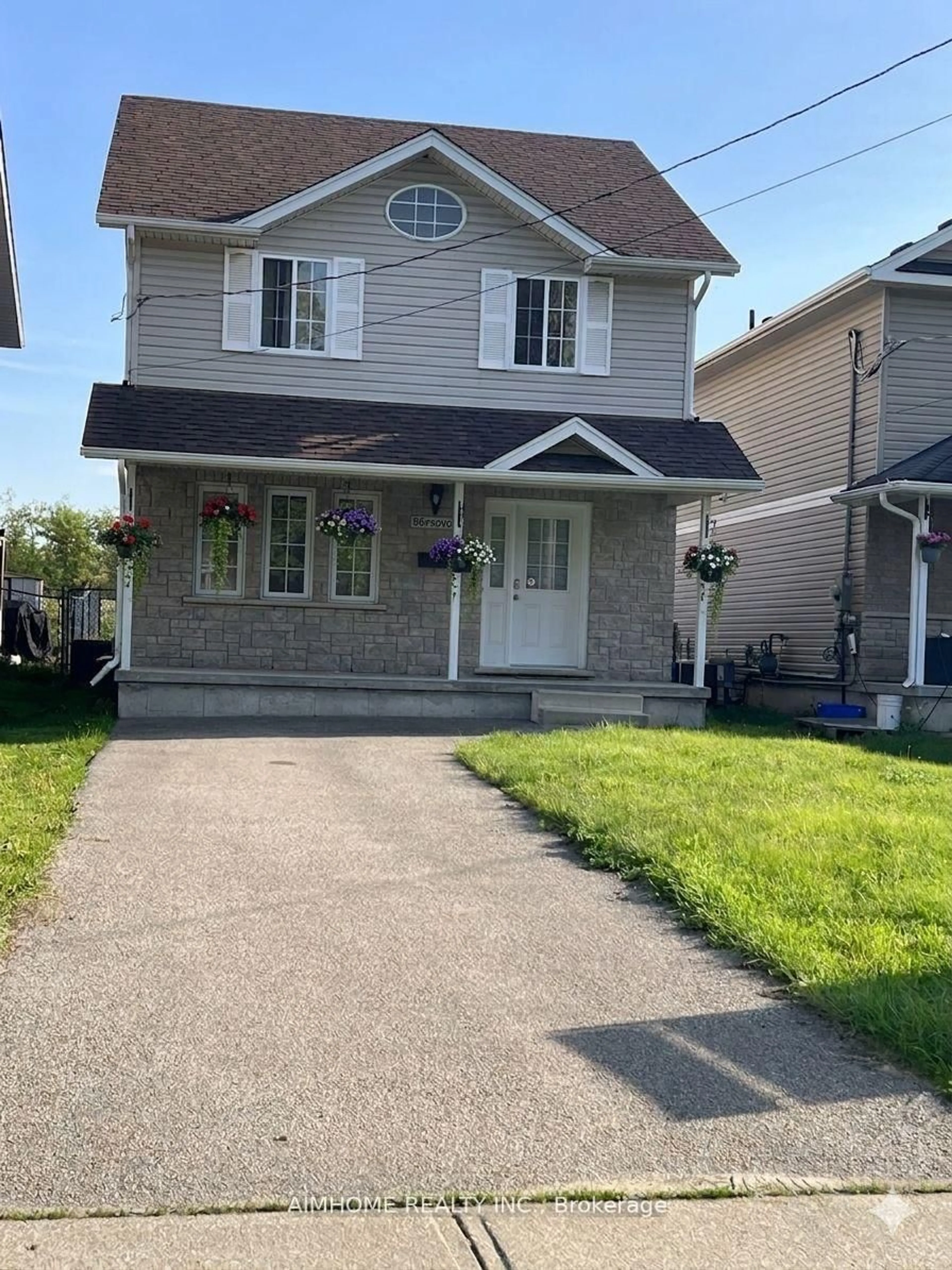 Home with vinyl exterior material, street for 36 Grand River Ave, Brantford Ontario N3T 4W7