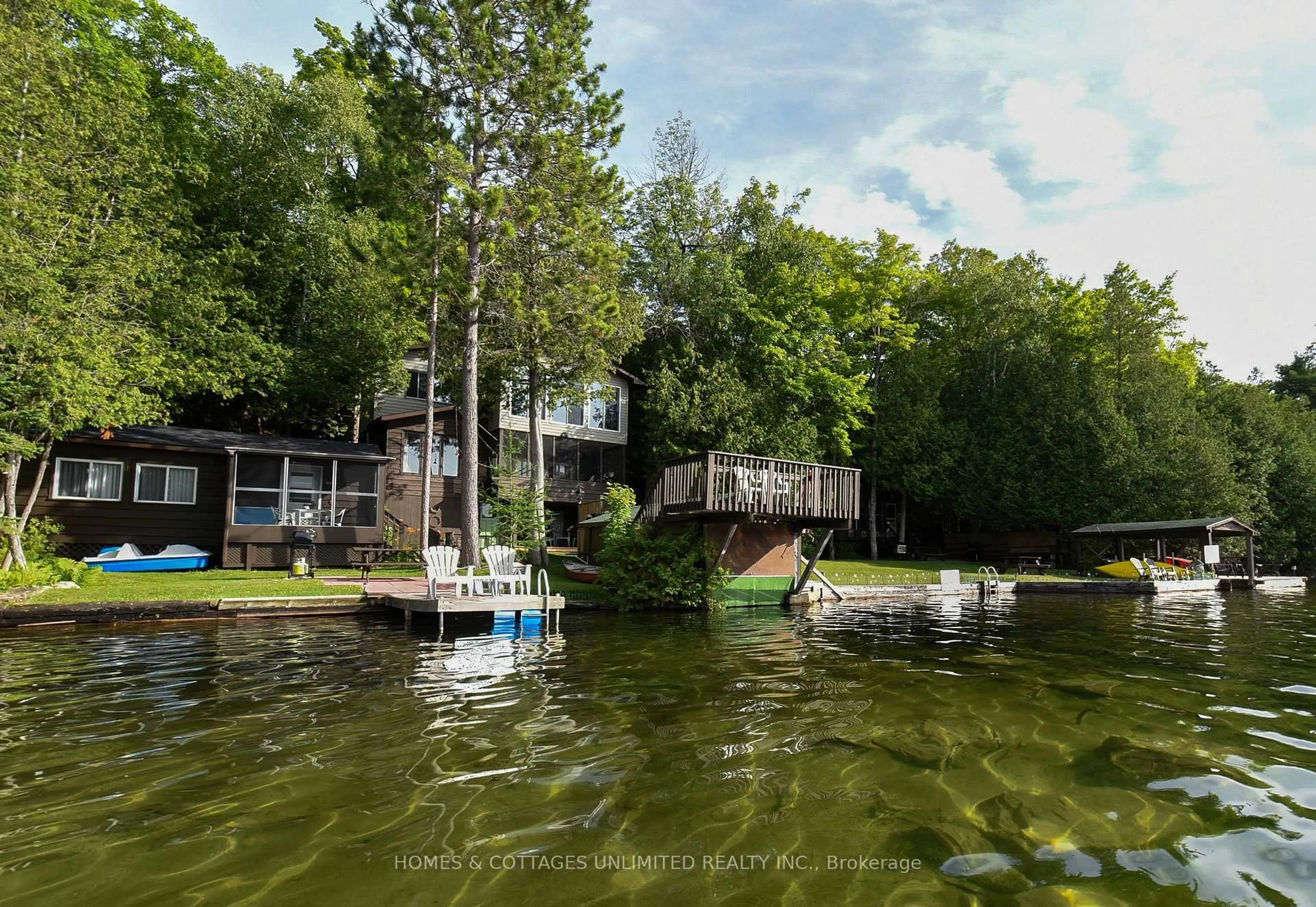 A pic from outside/outdoor area/front of a property/back of a property/a pic from drone, water/lake/river/ocean view for 1070 Young Lane, Ompah Ontario K0H 2J0