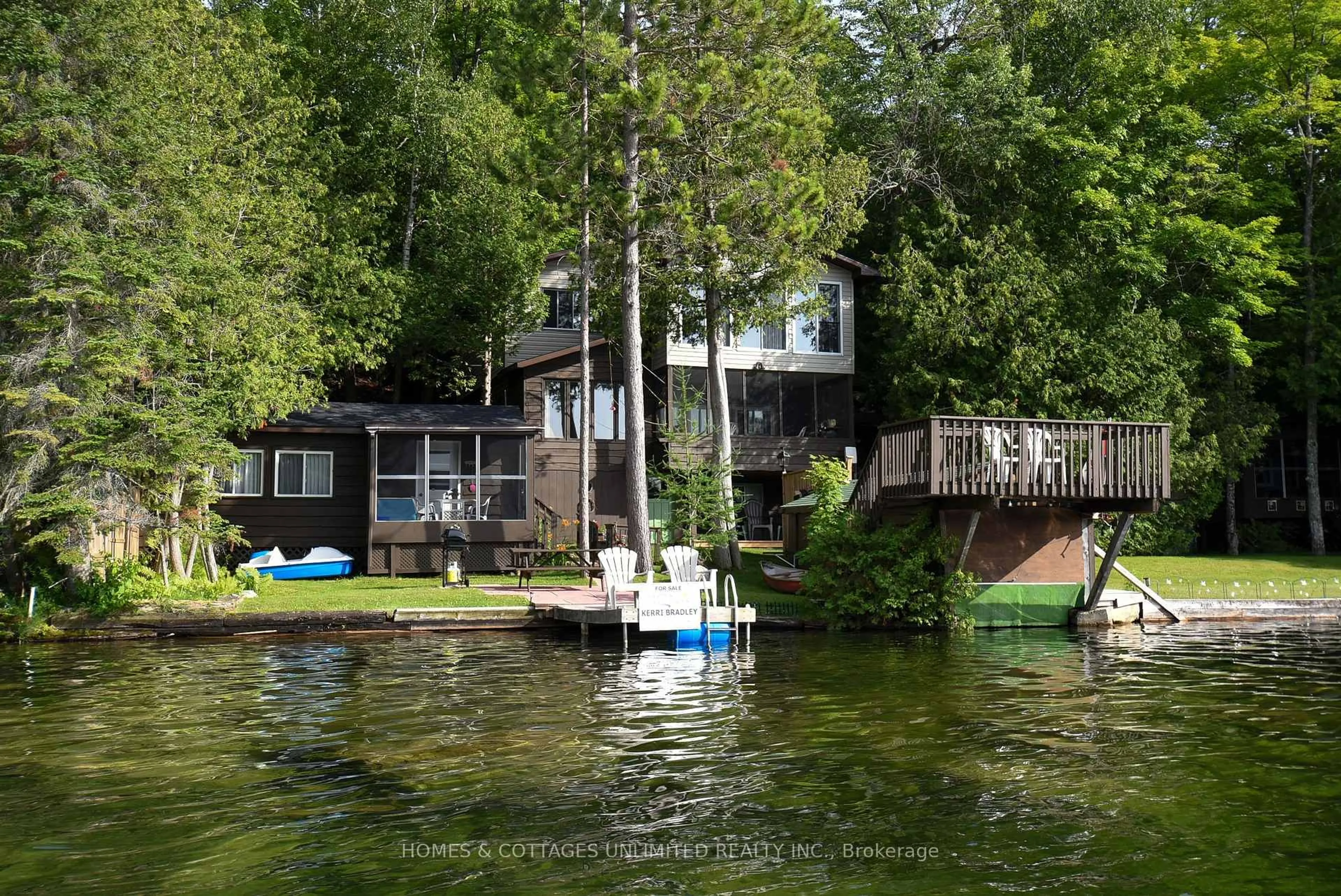 A pic from outside/outdoor area/front of a property/back of a property/a pic from drone, water/lake/river/ocean view for 1070 Young Lane, Ompah Ontario K0H 2J0