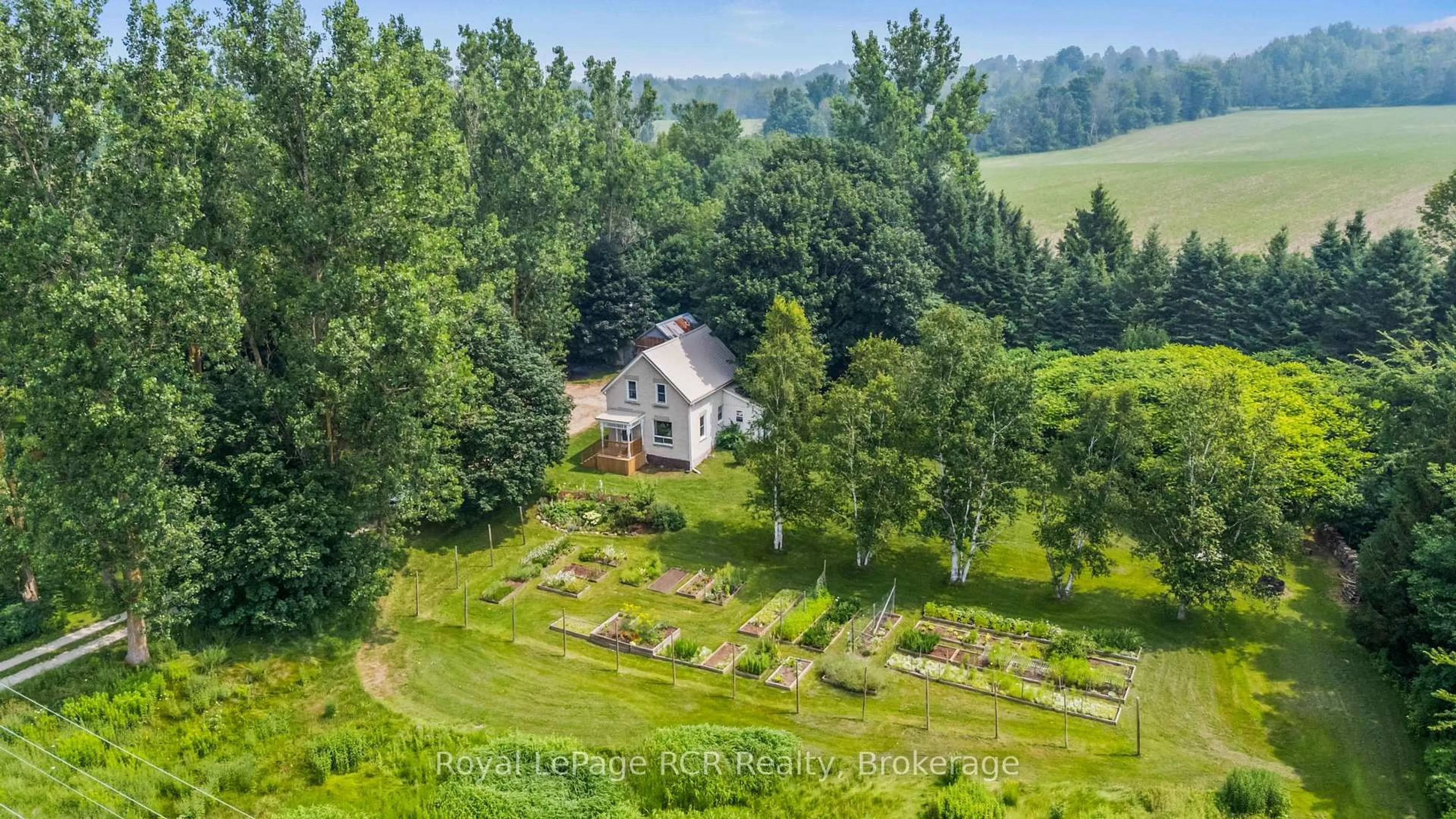A pic from outside/outdoor area/front of a property/back of a property/a pic from drone, forest/trees view for 14547 Bruce Road 10, West Grey Ontario N0G 1S0