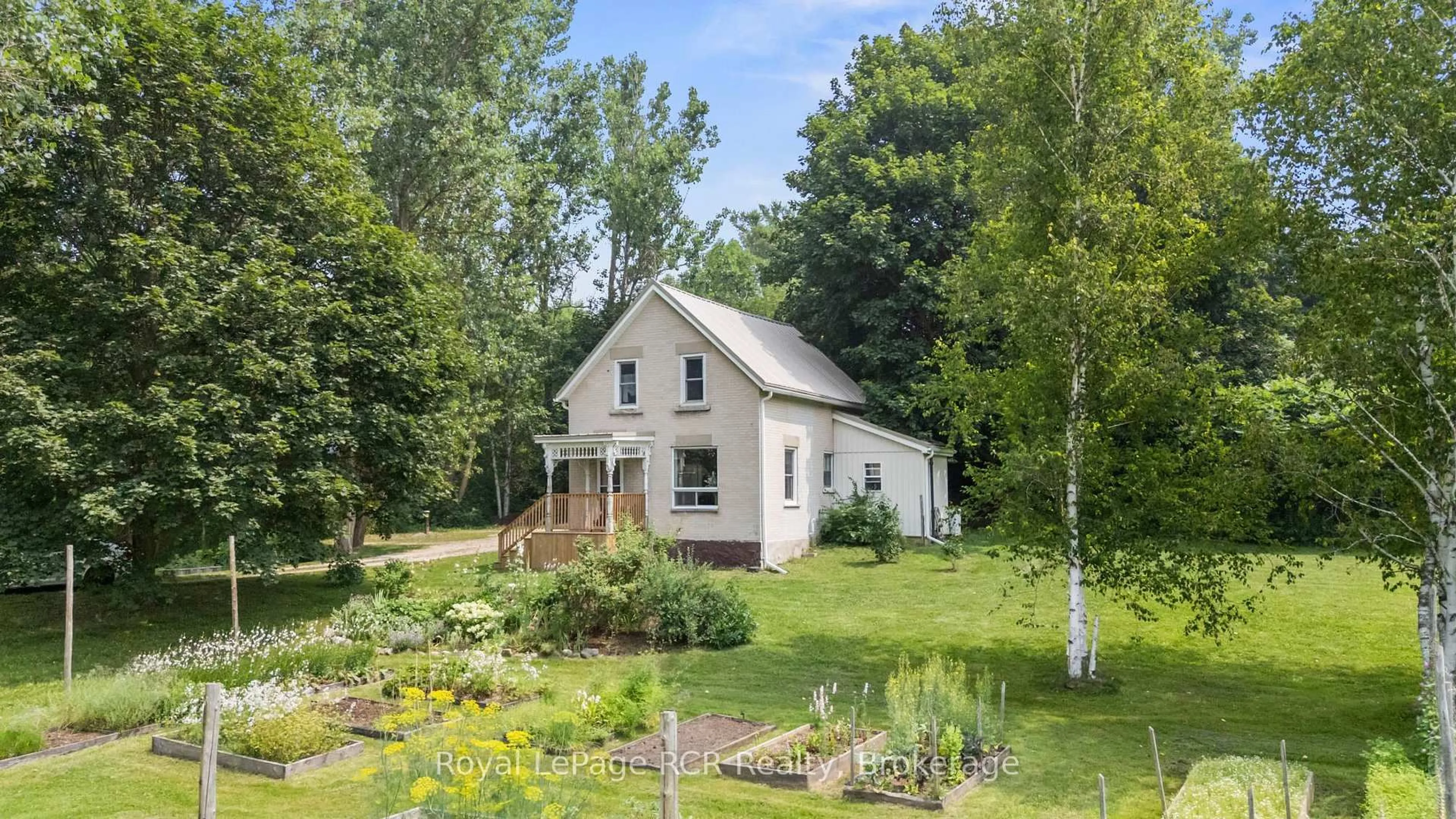 A pic from outside/outdoor area/front of a property/back of a property/a pic from drone, street for 14547 Bruce Road 10, West Grey Ontario N0G 1S0