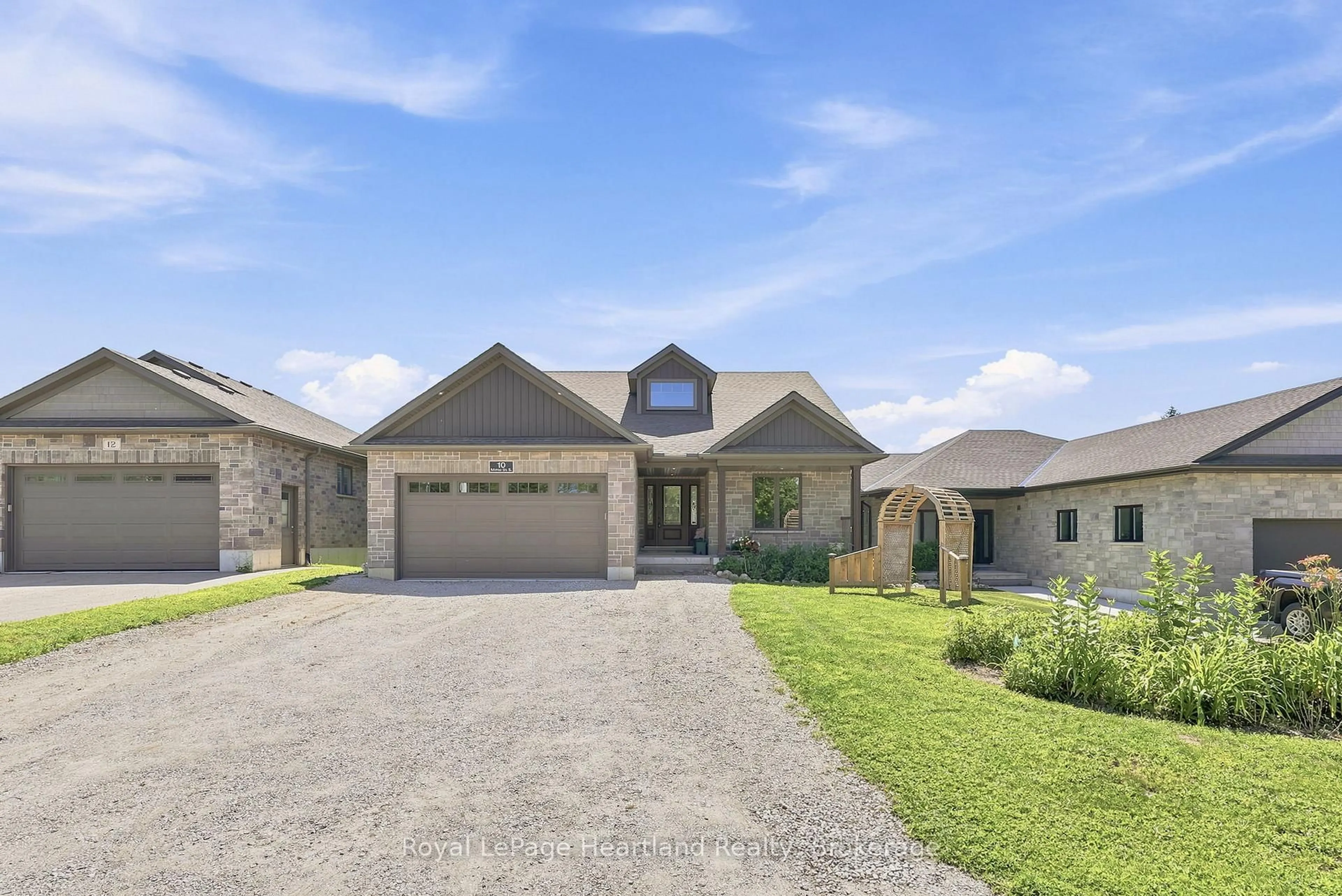 Home with brick exterior material, street for 10 Minto St, Minto Ontario N0G 1M0