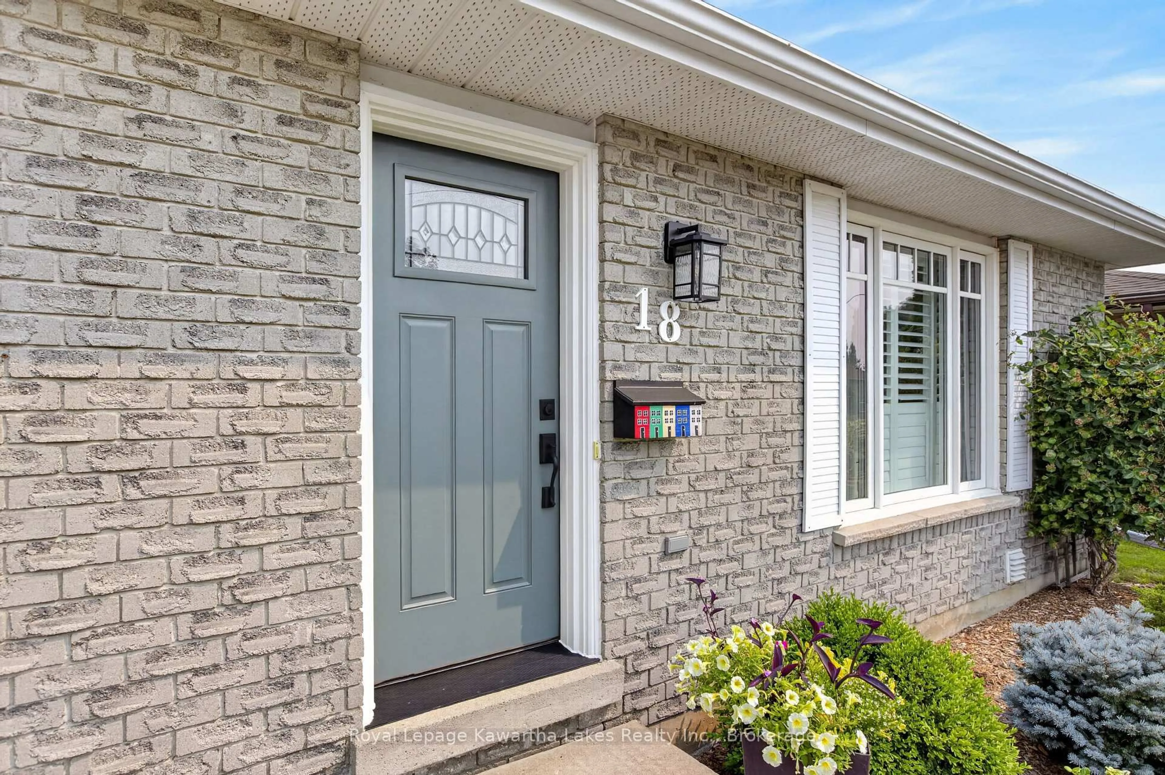 Home with brick exterior material, street for 18 Madill Cres, Kawartha Lakes Ontario K9V 5W8