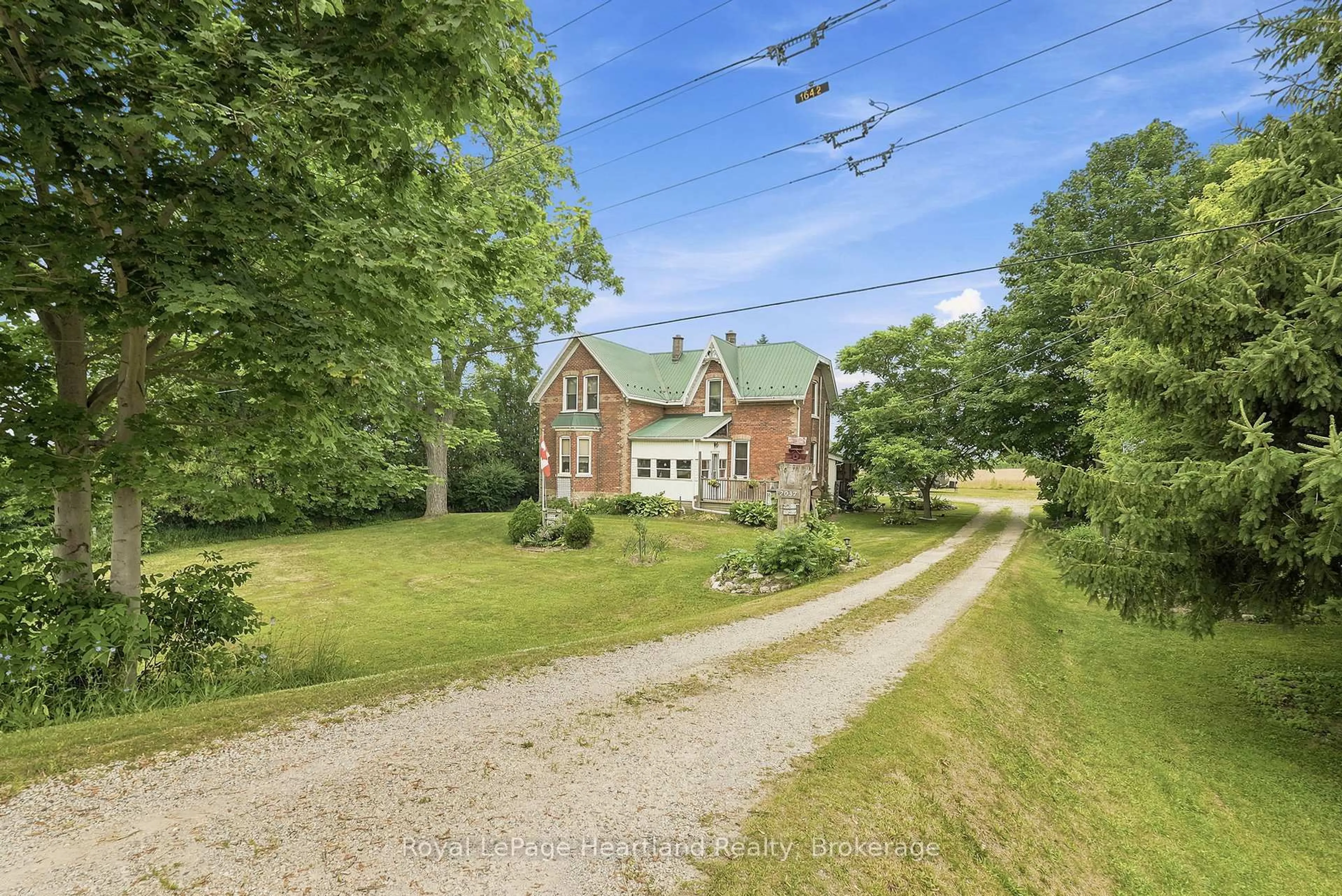 A pic from outside/outdoor area/front of a property/back of a property/a pic from drone, street for 2037 Harriston Rd, Howick Ontario N0G 1X0