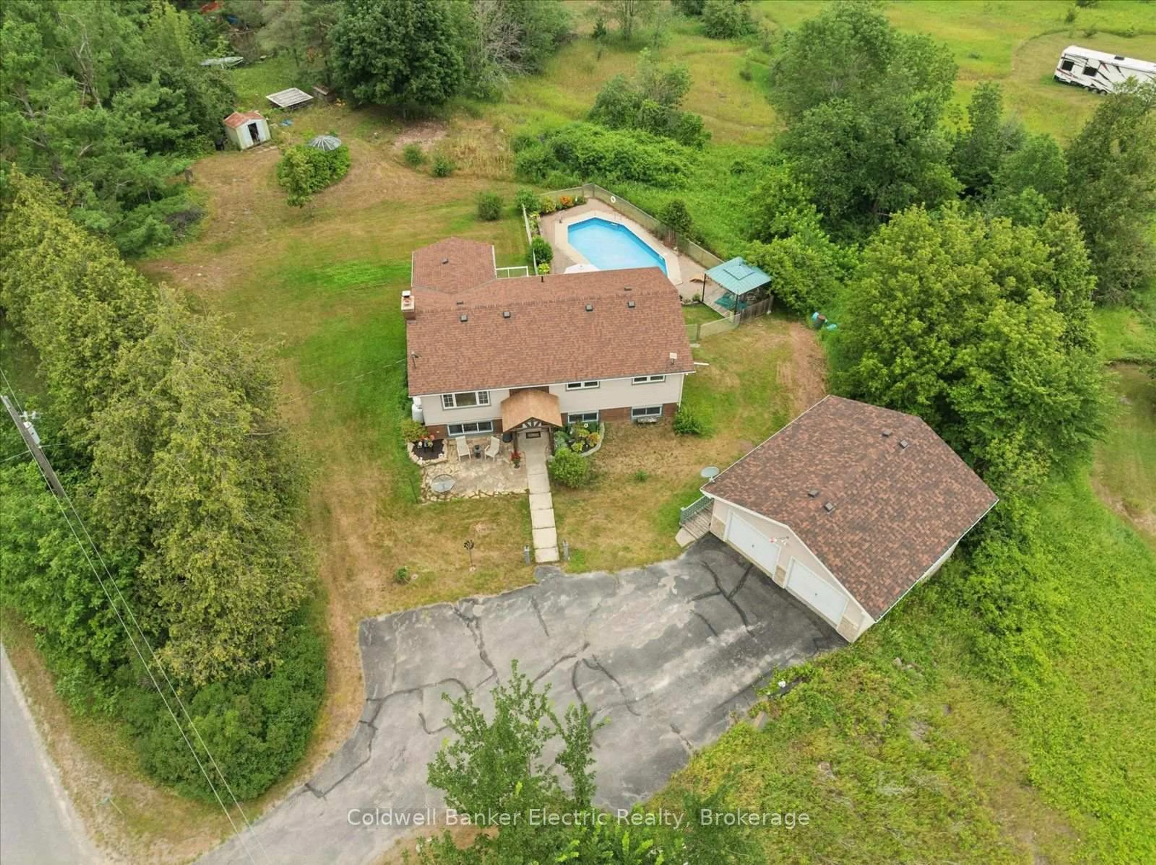 A pic from outside/outdoor area/front of a property/back of a property/a pic from drone, unknown for 1657 4th Line, Douro-Dummer Ontario K0L 2H0