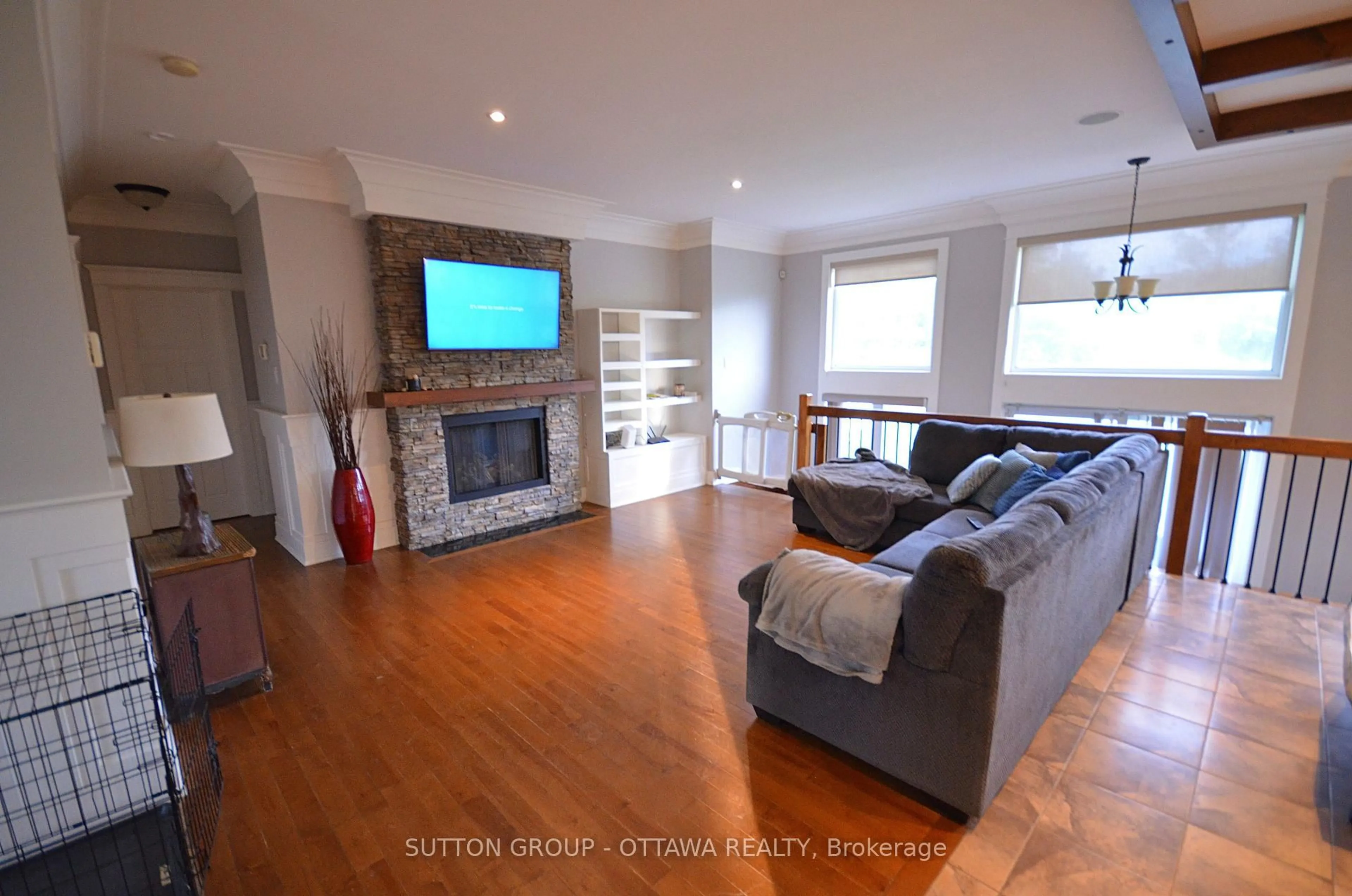 Living room with furniture, wood/laminate floor for 588 Russell Rd, Clarence-Rockland Ontario K0A 2A0