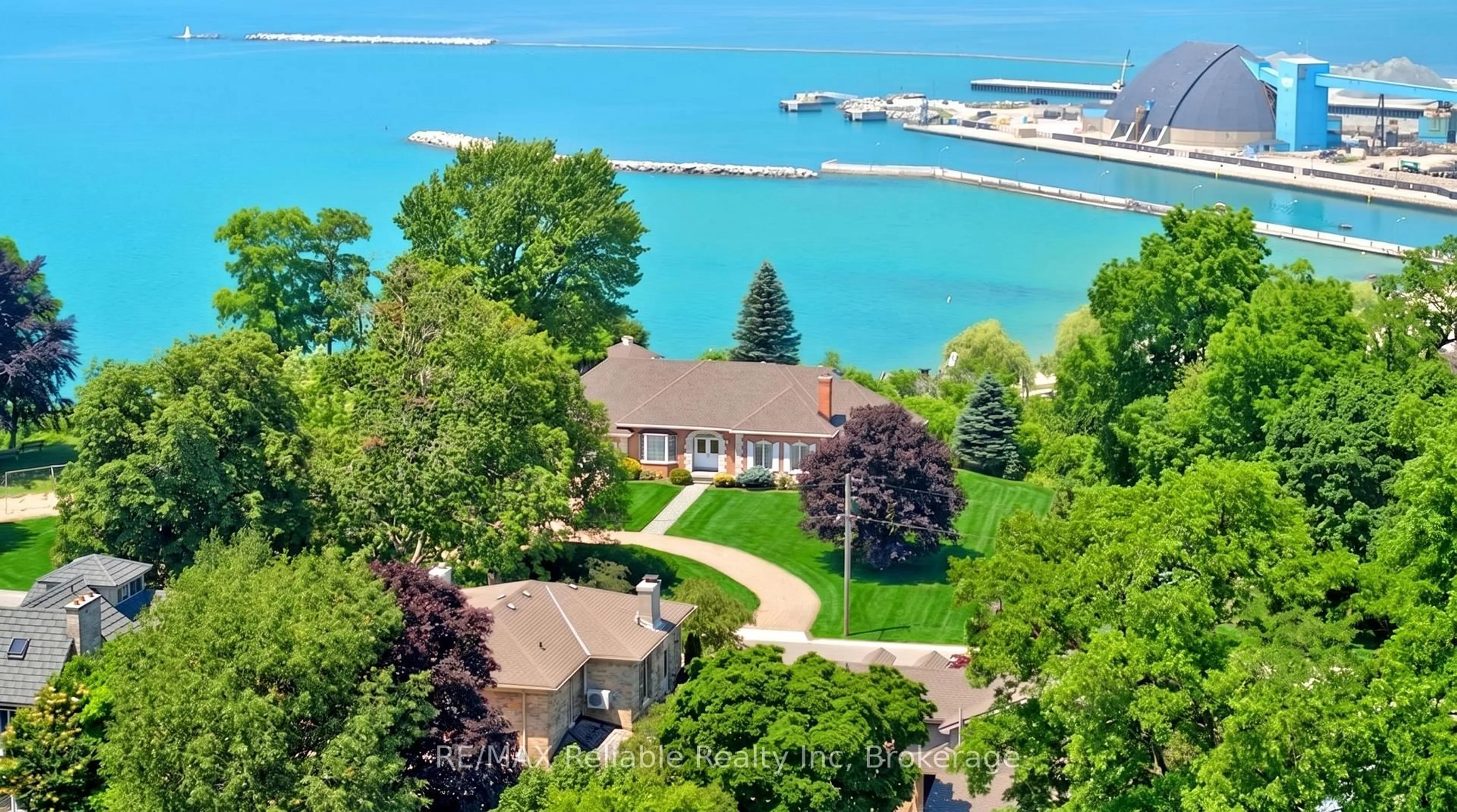 A pic from outside/outdoor area/front of a property/back of a property/a pic from drone, water/lake/river/ocean view for 1 Harbour Lane, Goderich Ontario N7A 4J8