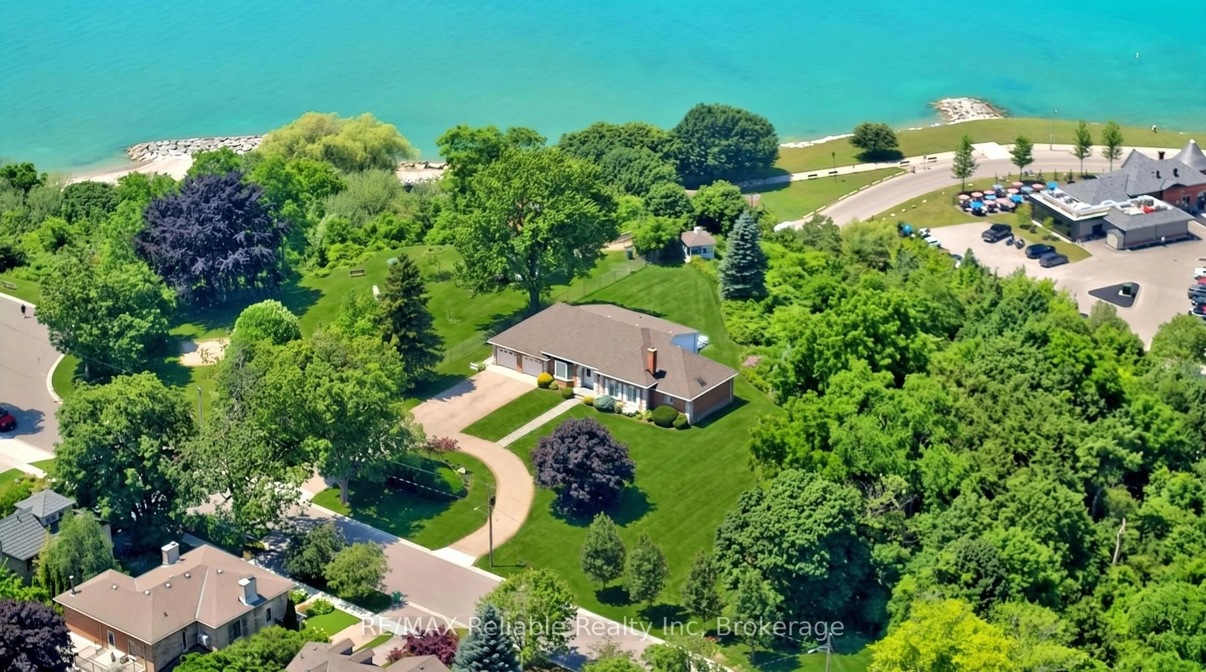 A pic from outside/outdoor area/front of a property/back of a property/a pic from drone, water/lake/river/ocean view for 1 Harbour Lane, Goderich Ontario N7A 4J8