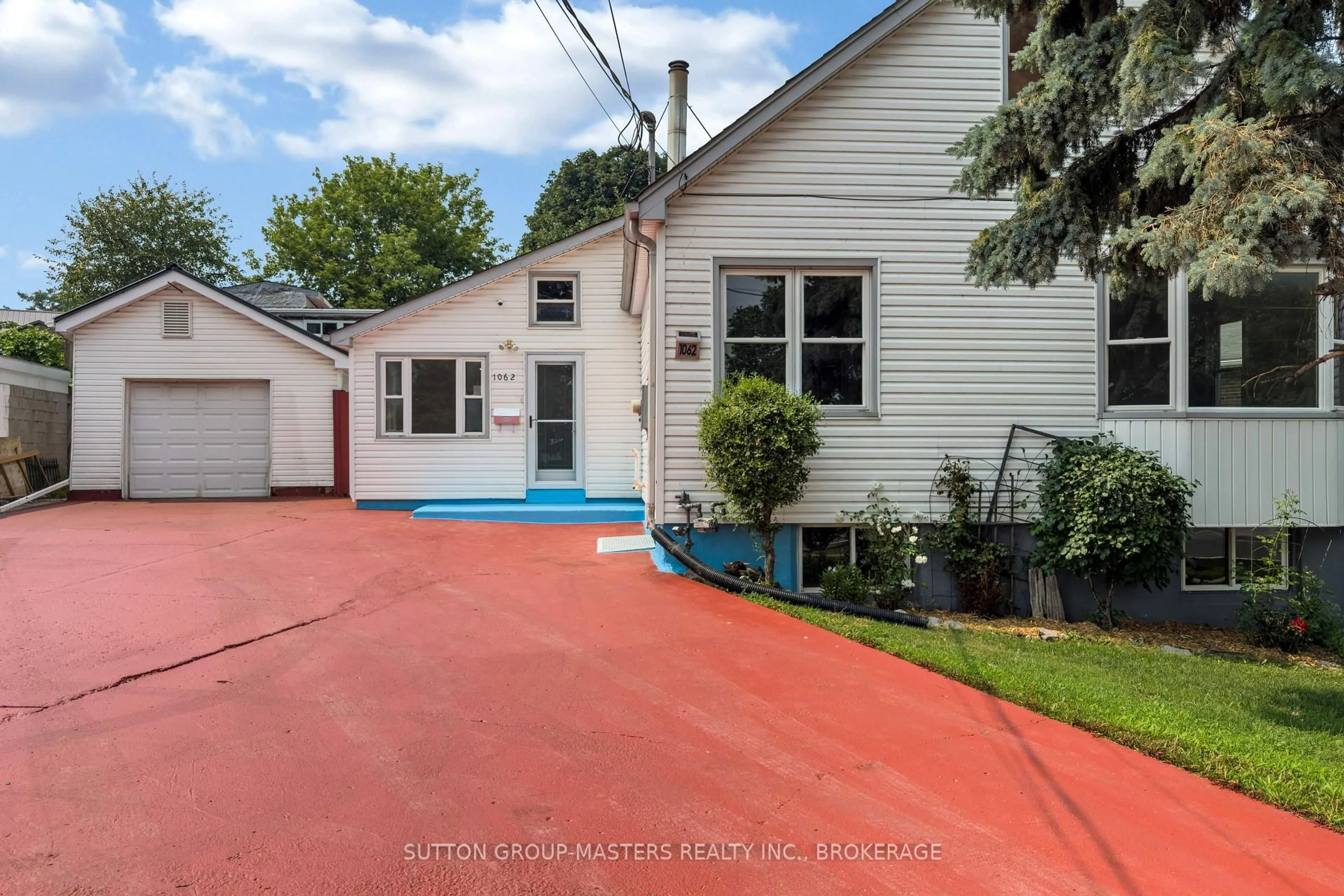Home with vinyl exterior material, street for 1062 Montreal St, Kingston Ontario K7K 3K4