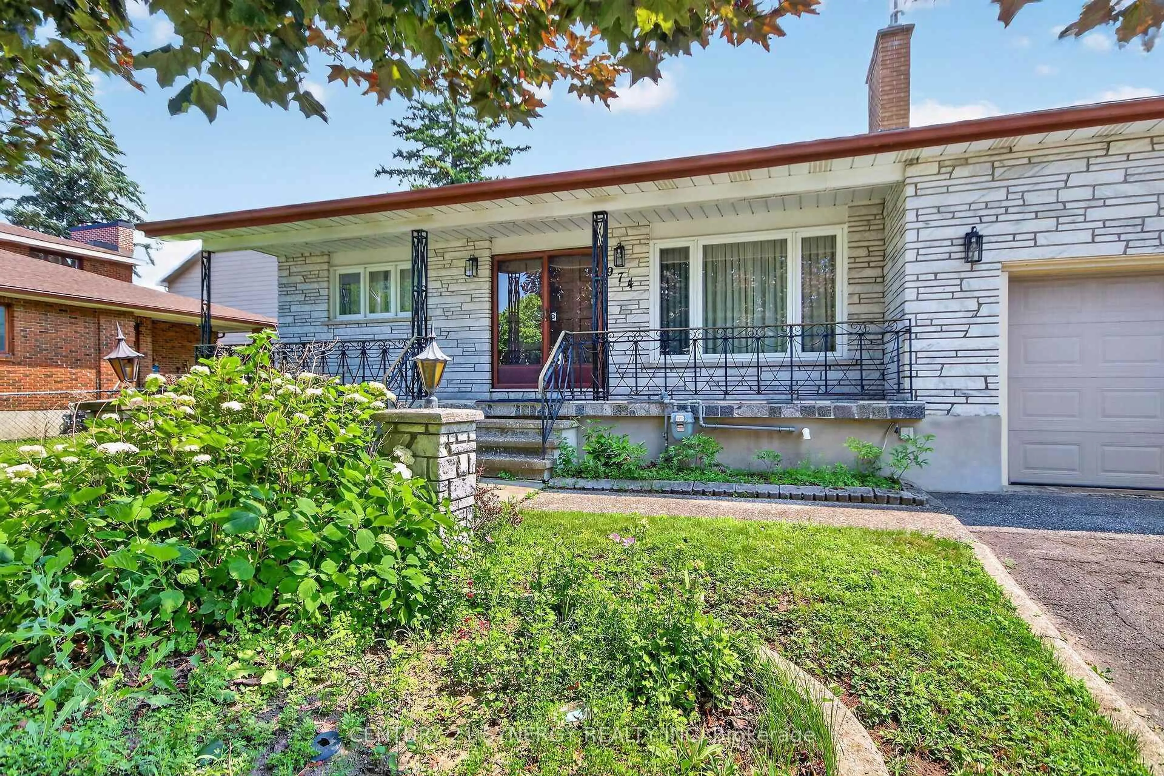 Home with brick exterior material, street for 974 Greenbriar Ave, Ottawa Ontario K2C 0J7