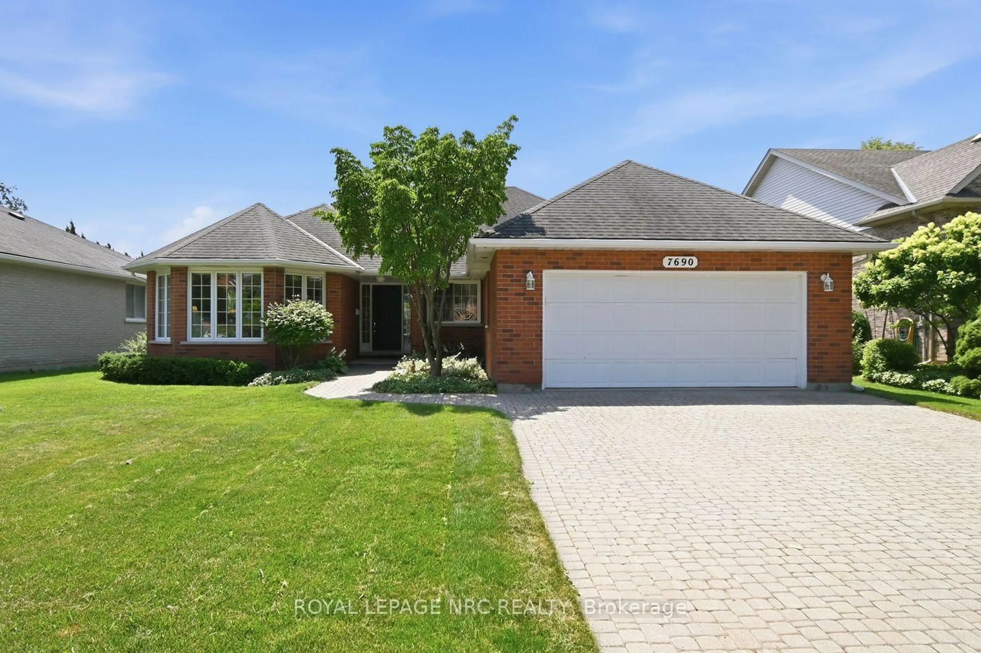 Home with brick exterior material, street for 7690 Mount Carmel Blvd, Niagara Falls Ontario L2H 2Y3
