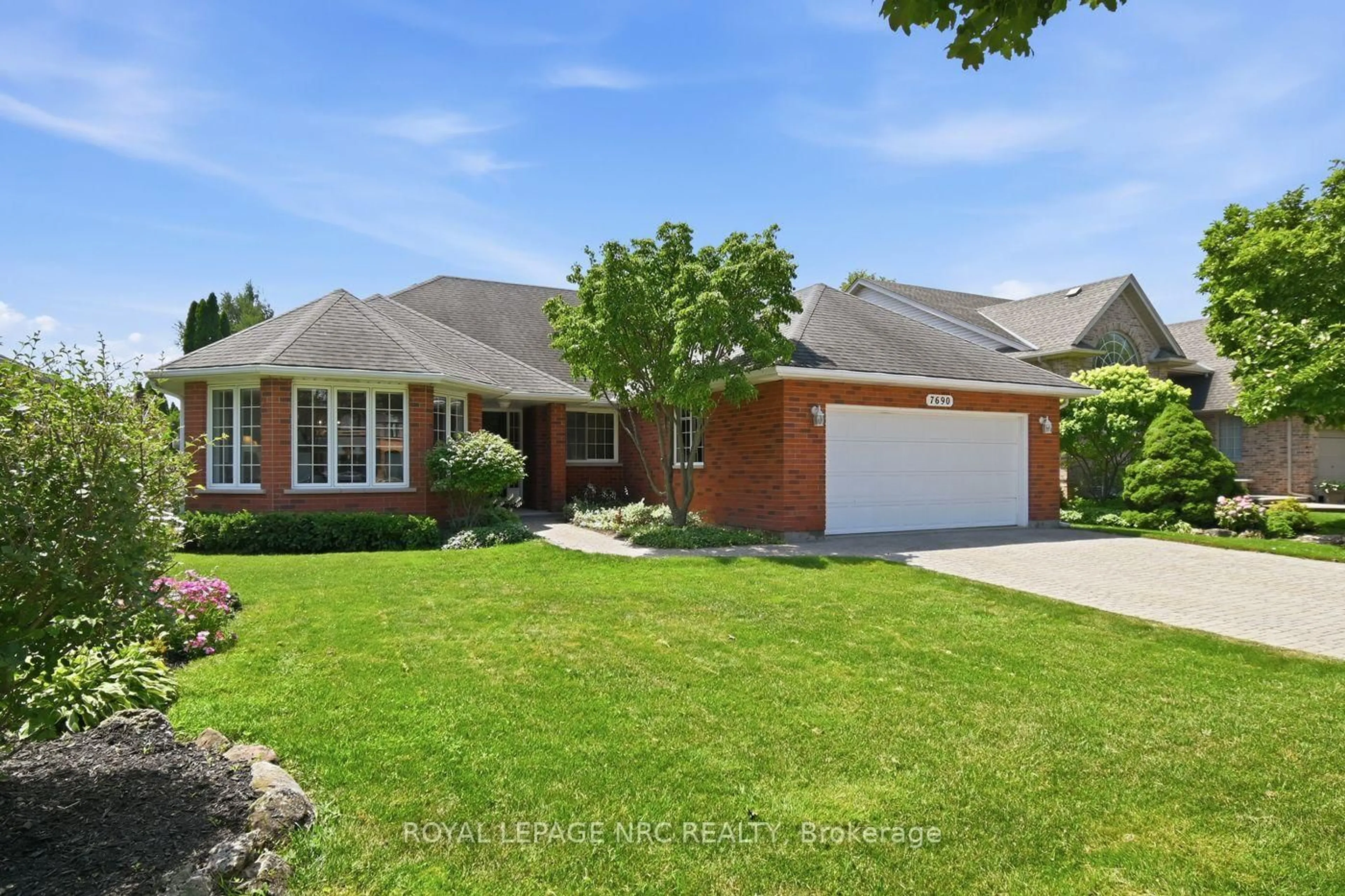 Home with brick exterior material, street for 7690 Mount Carmel Blvd, Niagara Falls Ontario L2H 2Y3