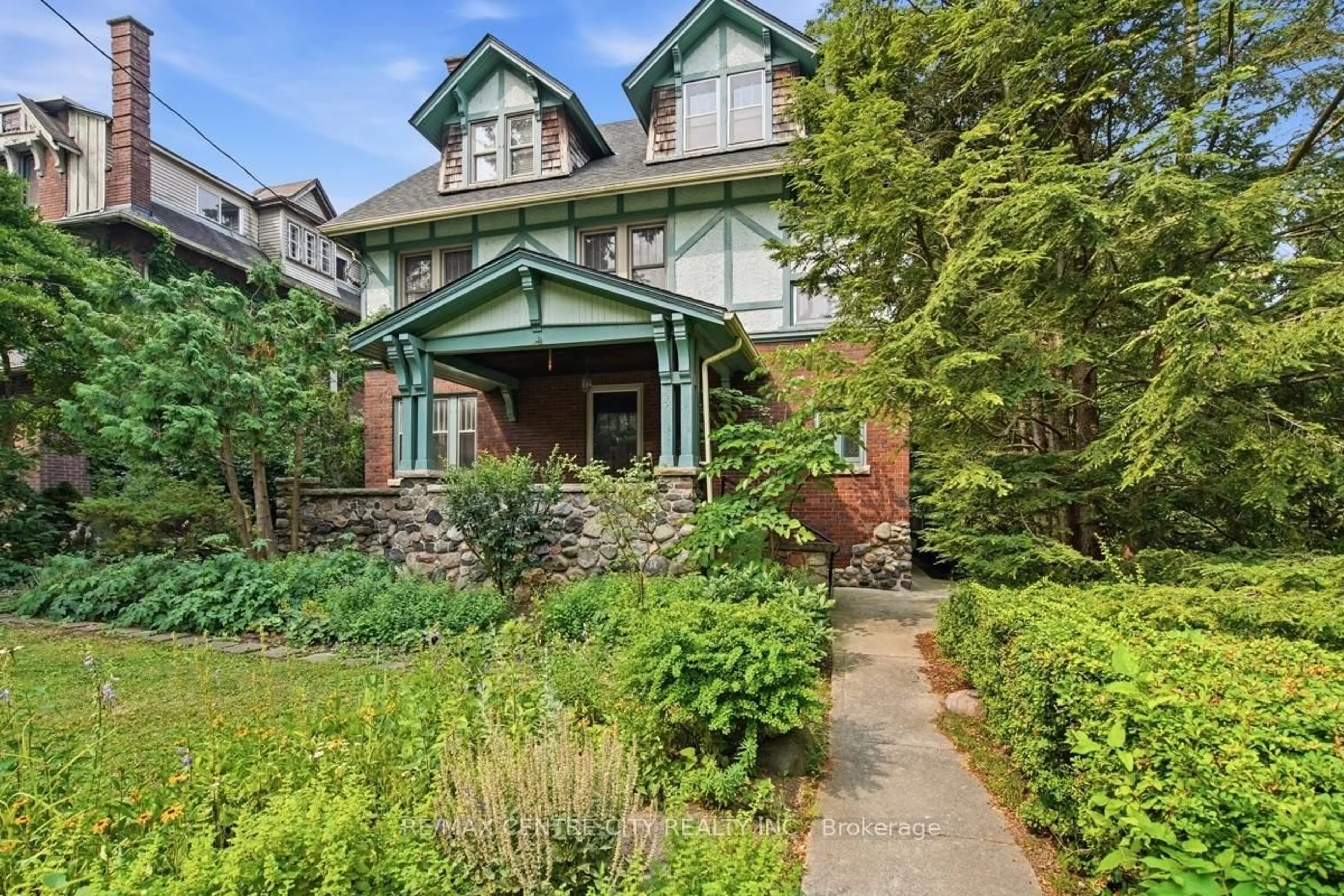 Home with brick exterior material, street for 927 Richmond St, London East Ontario N6A 3J3
