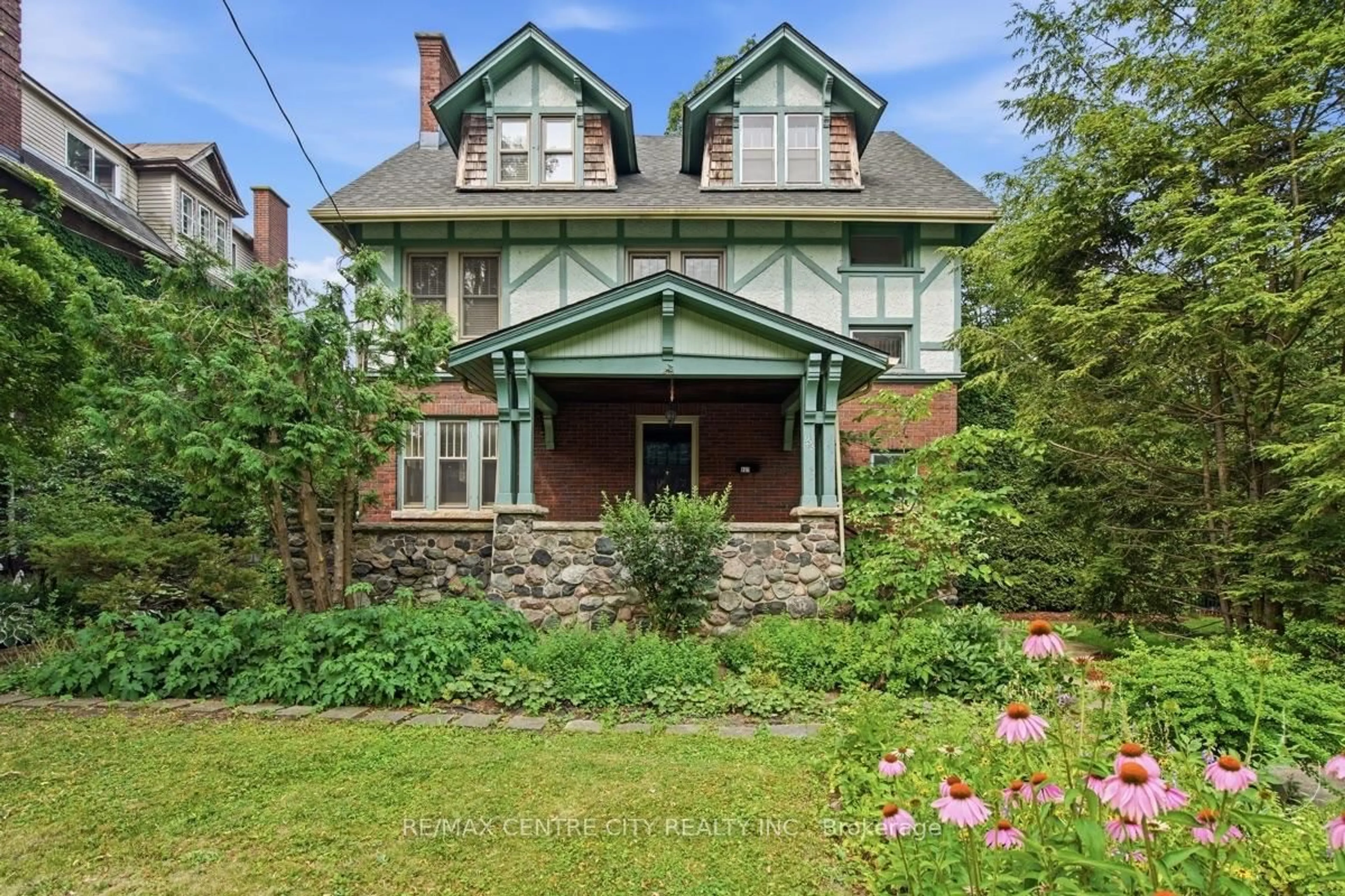 Home with brick exterior material, street for 927 Richmond St, London East Ontario N6A 3J3