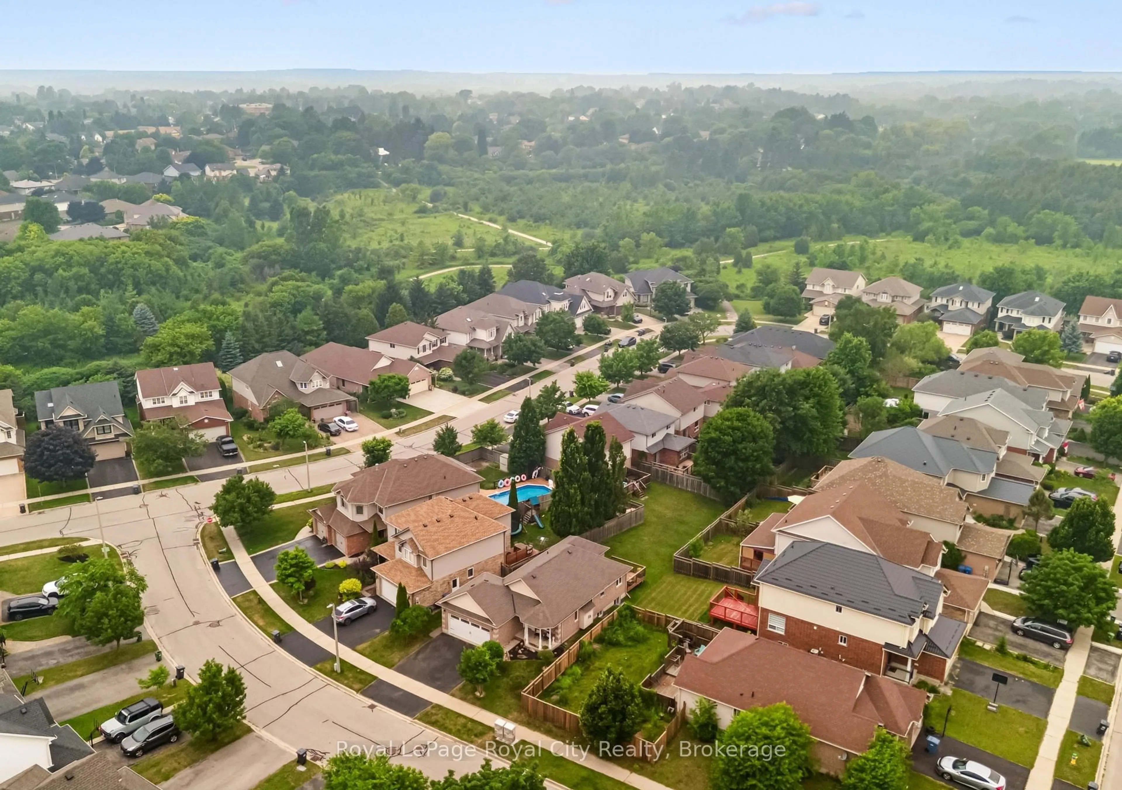 A pic from outside/outdoor area/front of a property/back of a property/a pic from drone, street for 3 Marigold Dr, Guelph Ontario N1C 1G7