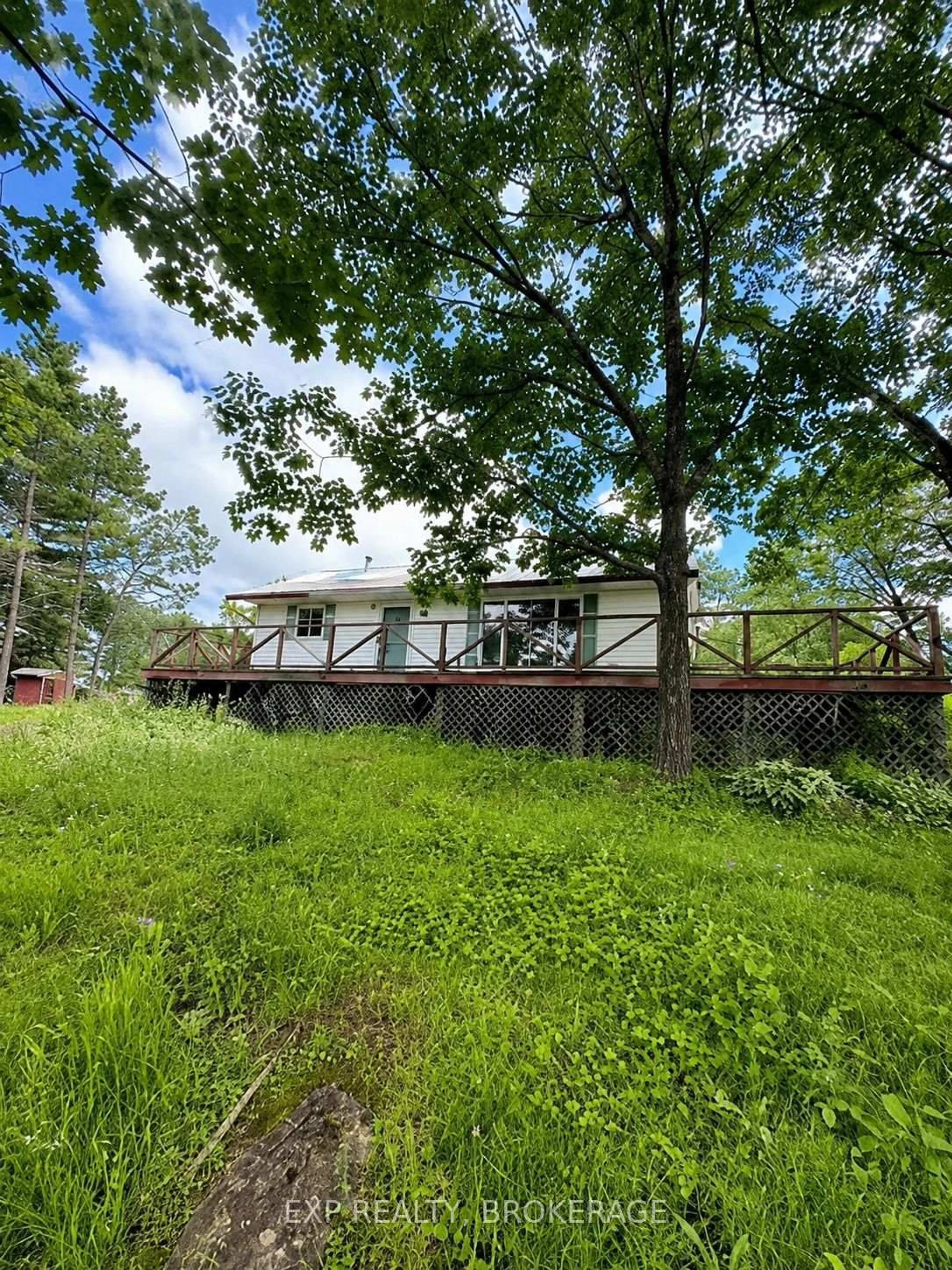 A pic from outside/outdoor area/front of a property/back of a property/a pic from drone, forest/trees view for 1966 Cross Rd, Maberly Ontario K0H 2B0