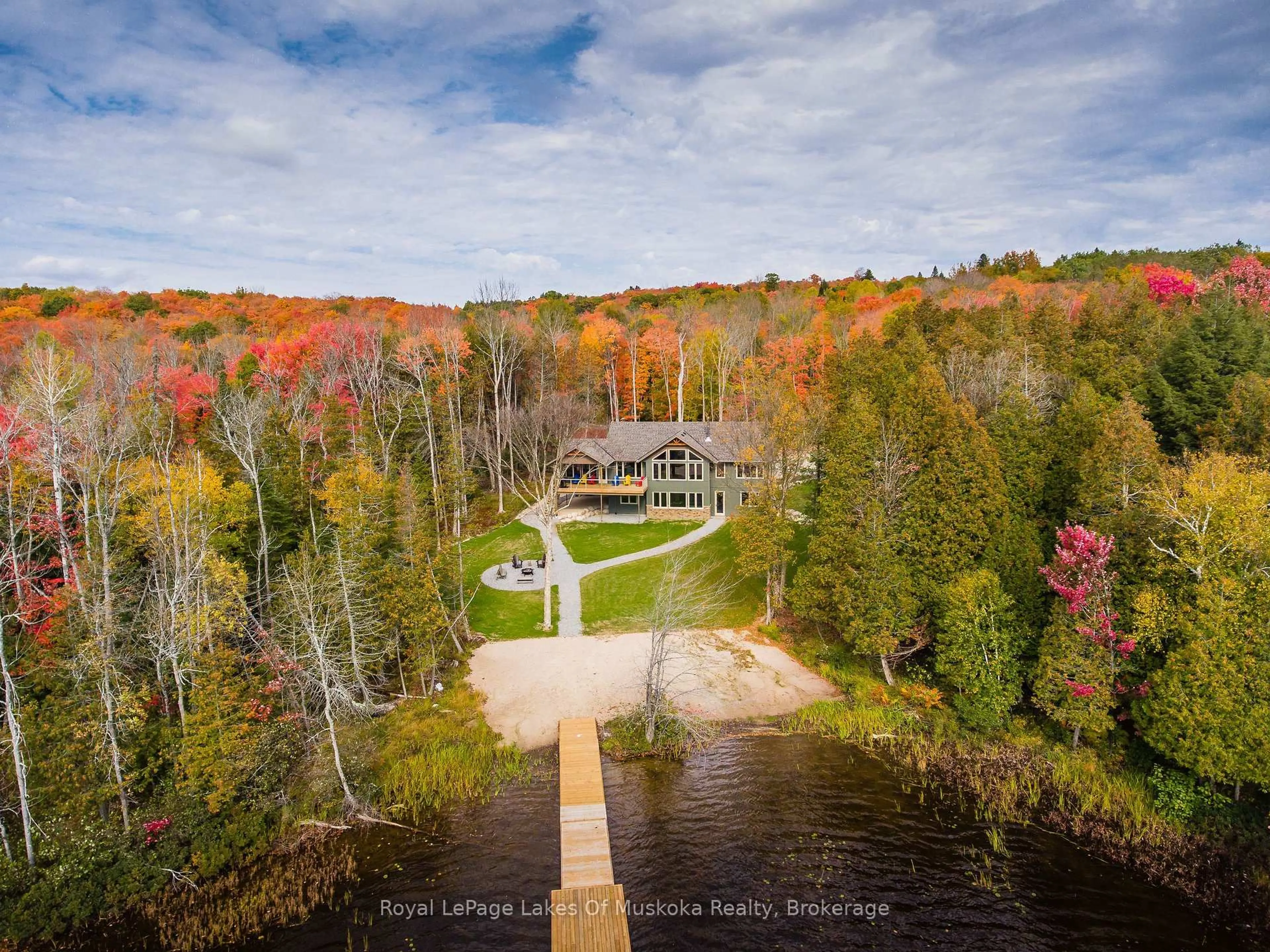 A pic from outside/outdoor area/front of a property/back of a property/a pic from drone, water/lake/river/ocean view for 60 Wurm Rd, Magnetawan Ontario P0A 1P0