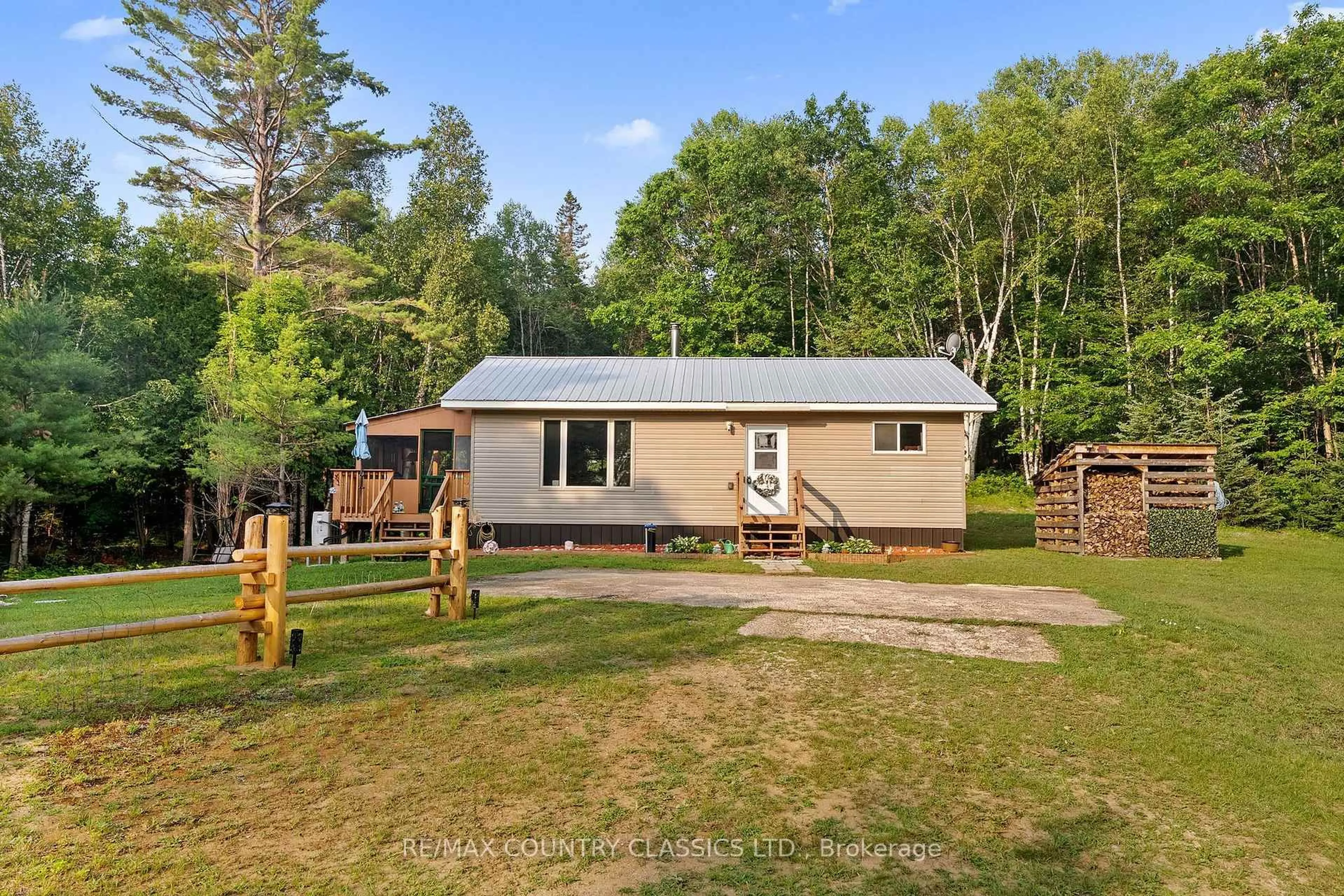 A pic from outside/outdoor area/front of a property/back of a property/a pic from drone, unknown for 528 Hwy No.28, Denbigh Ontario K0H 1L0