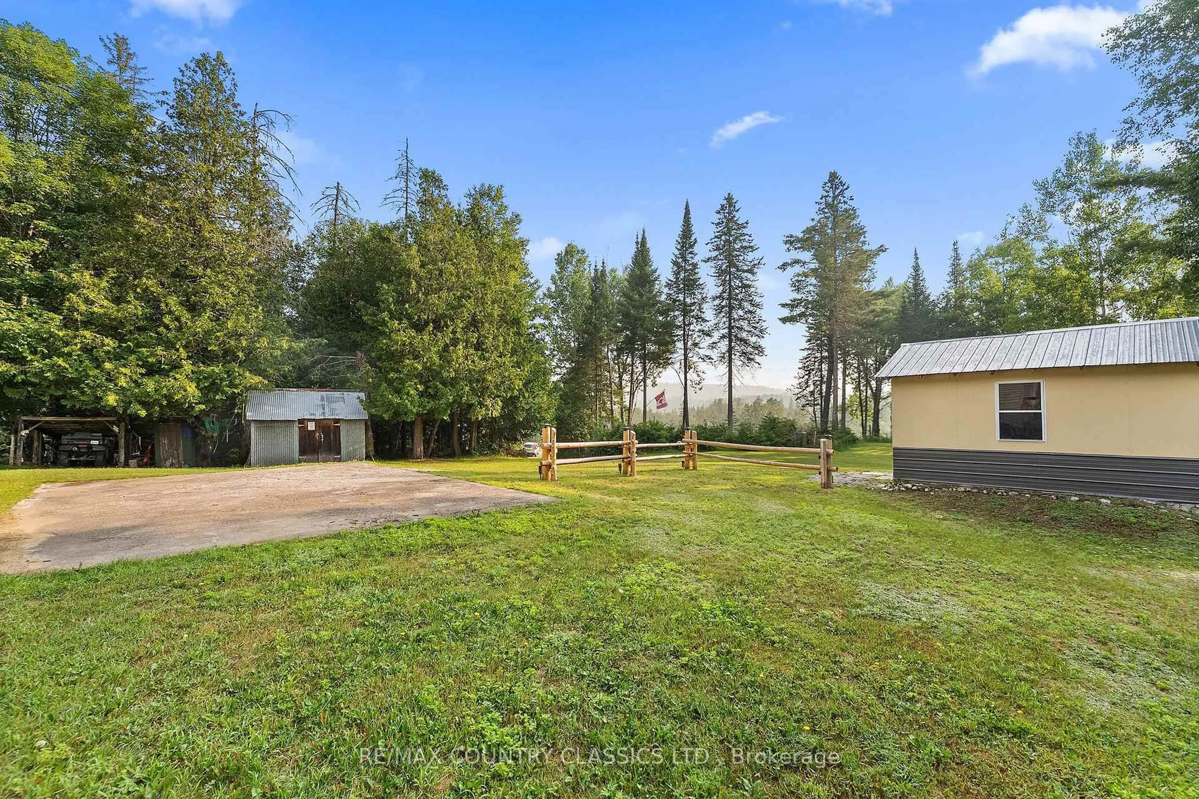A pic from outside/outdoor area/front of a property/back of a property/a pic from drone, forest/trees view for 528 Hwy No.28, Denbigh Ontario K0H 1L0