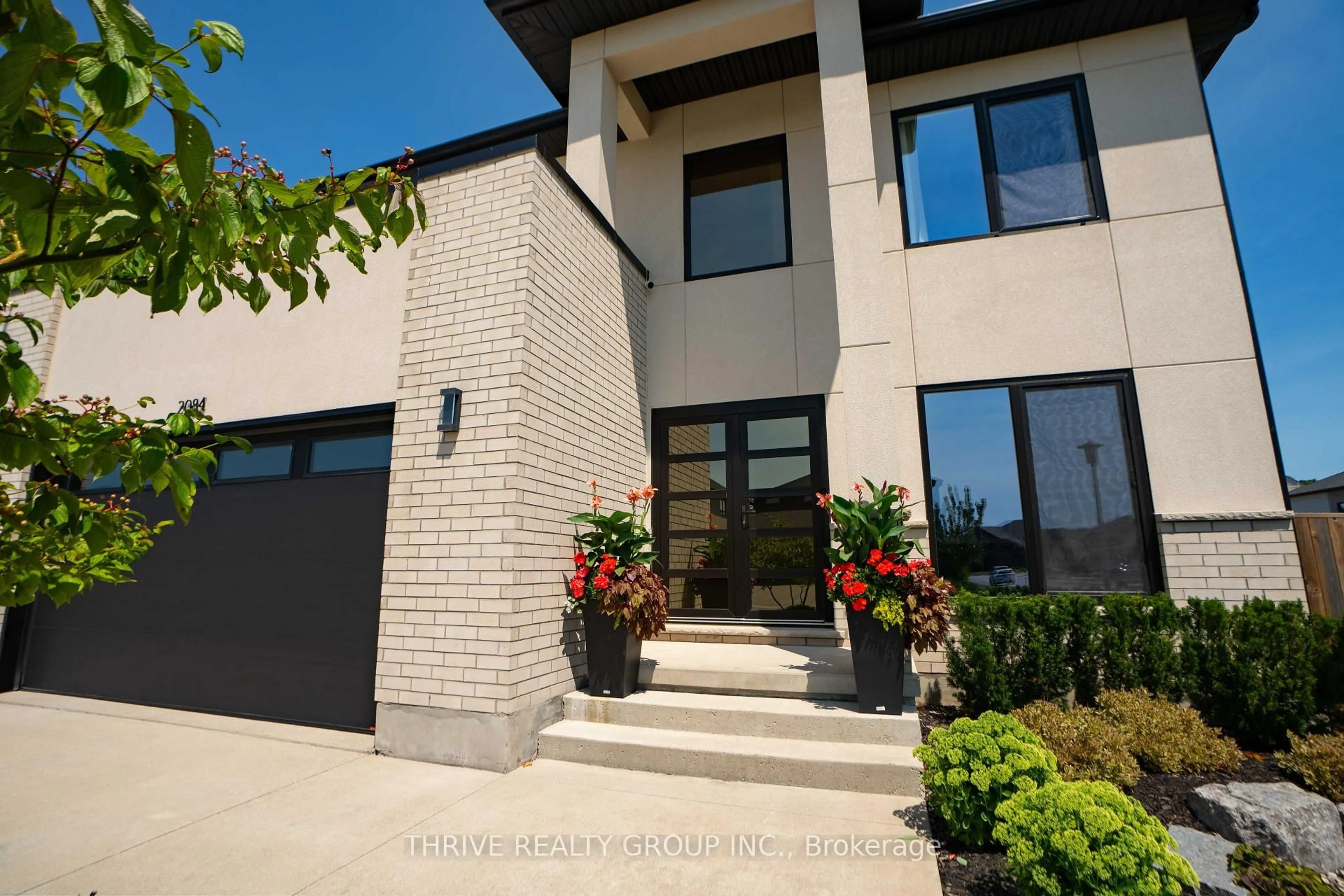 Home with brick exterior material, street for 2084 Tyson Walk, London South Ontario N6K 5R4
