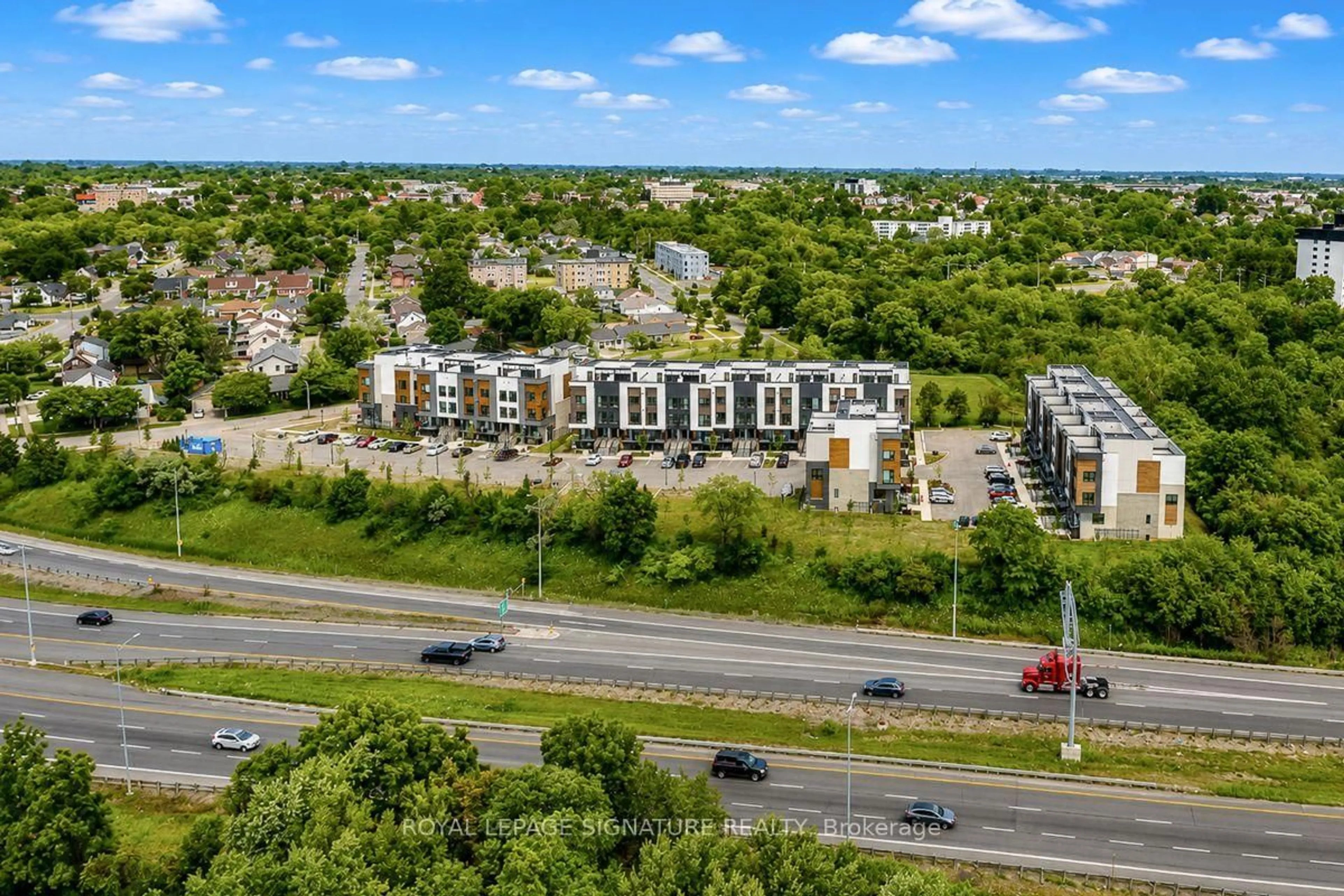 A pic from outside/outdoor area/front of a property/back of a property/a pic from drone, unknown for 16 Melbourne Ave #205C, St. Catharines Ontario L2P 0G5
