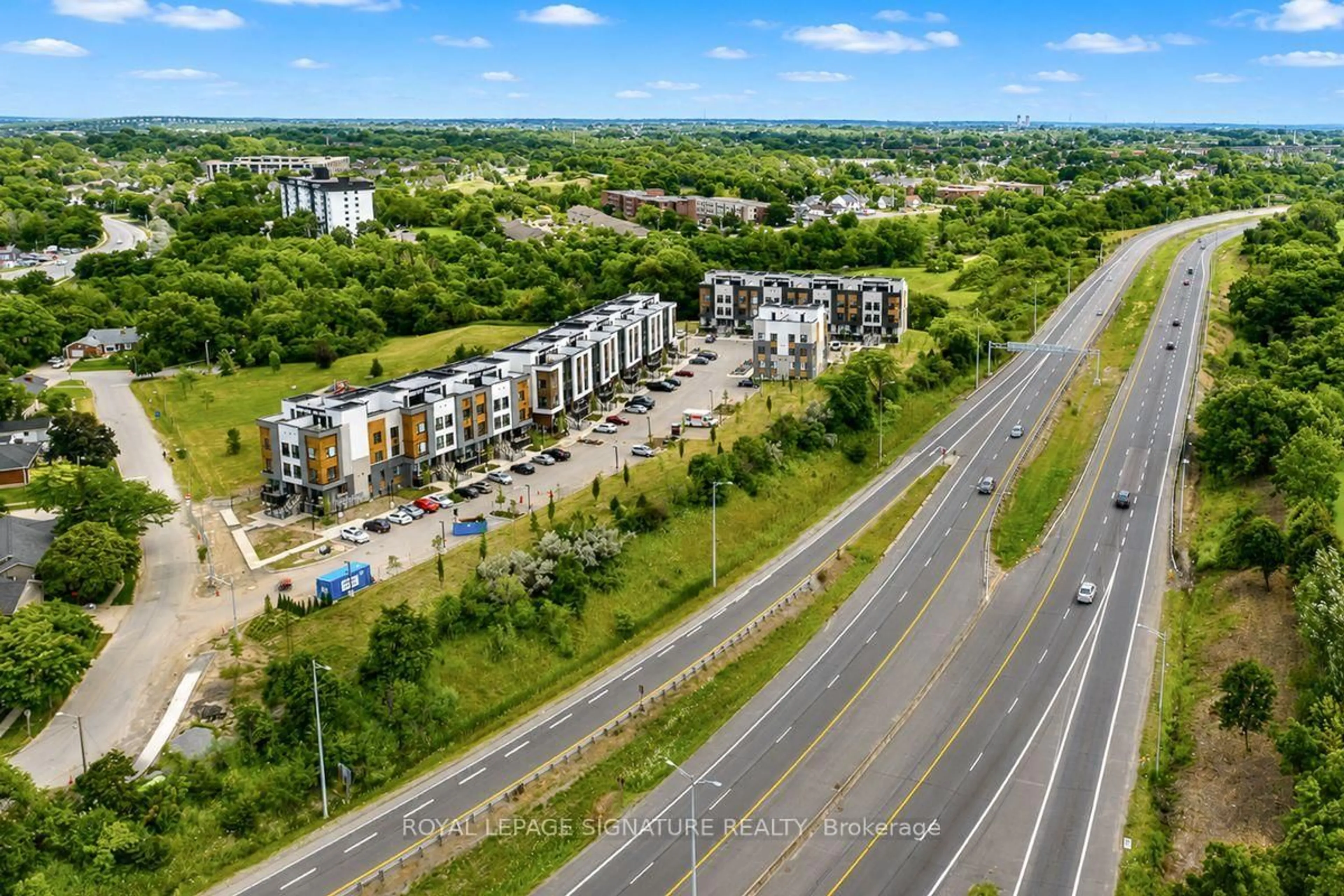 A pic from outside/outdoor area/front of a property/back of a property/a pic from drone, city buildings view from balcony for 16 Melbourne Ave #205C, St. Catharines Ontario L2P 0G5