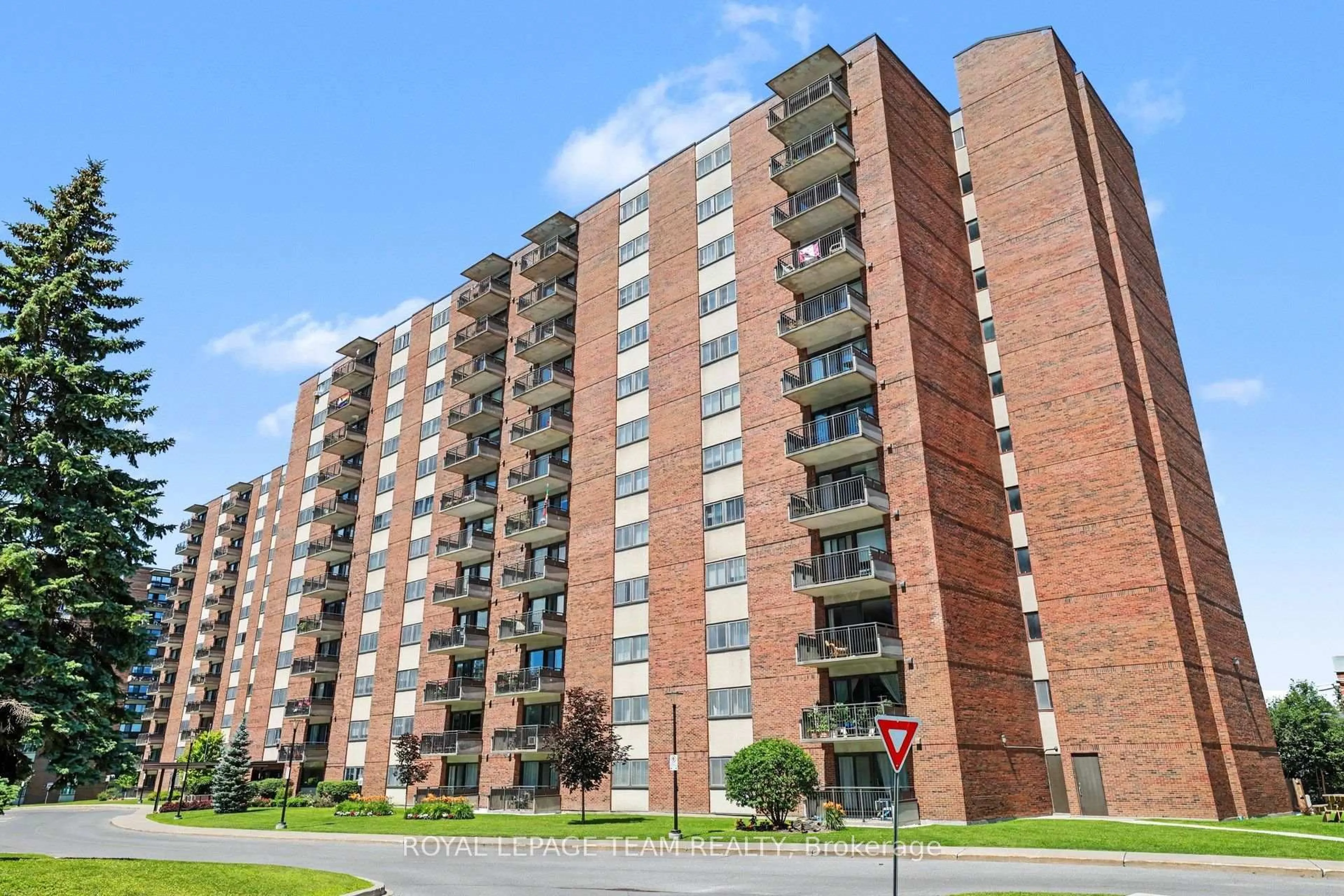 Home with brick exterior material, building for 1485 Baseline Rd #302, Ottawa Ontario K2C 3L8