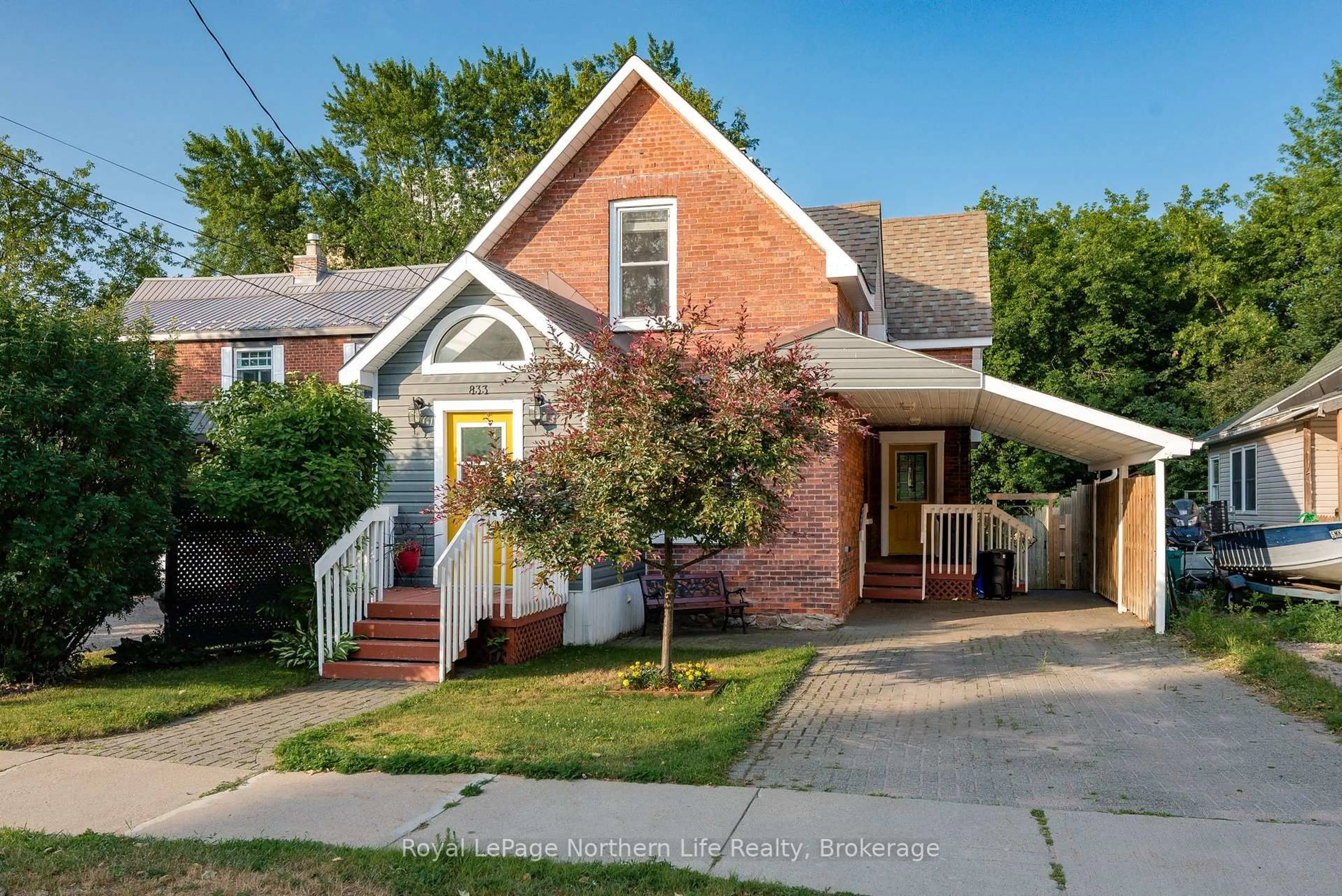 Home with brick exterior material, street for 833 McIntyre St, North Bay Ontario P1B 3A2