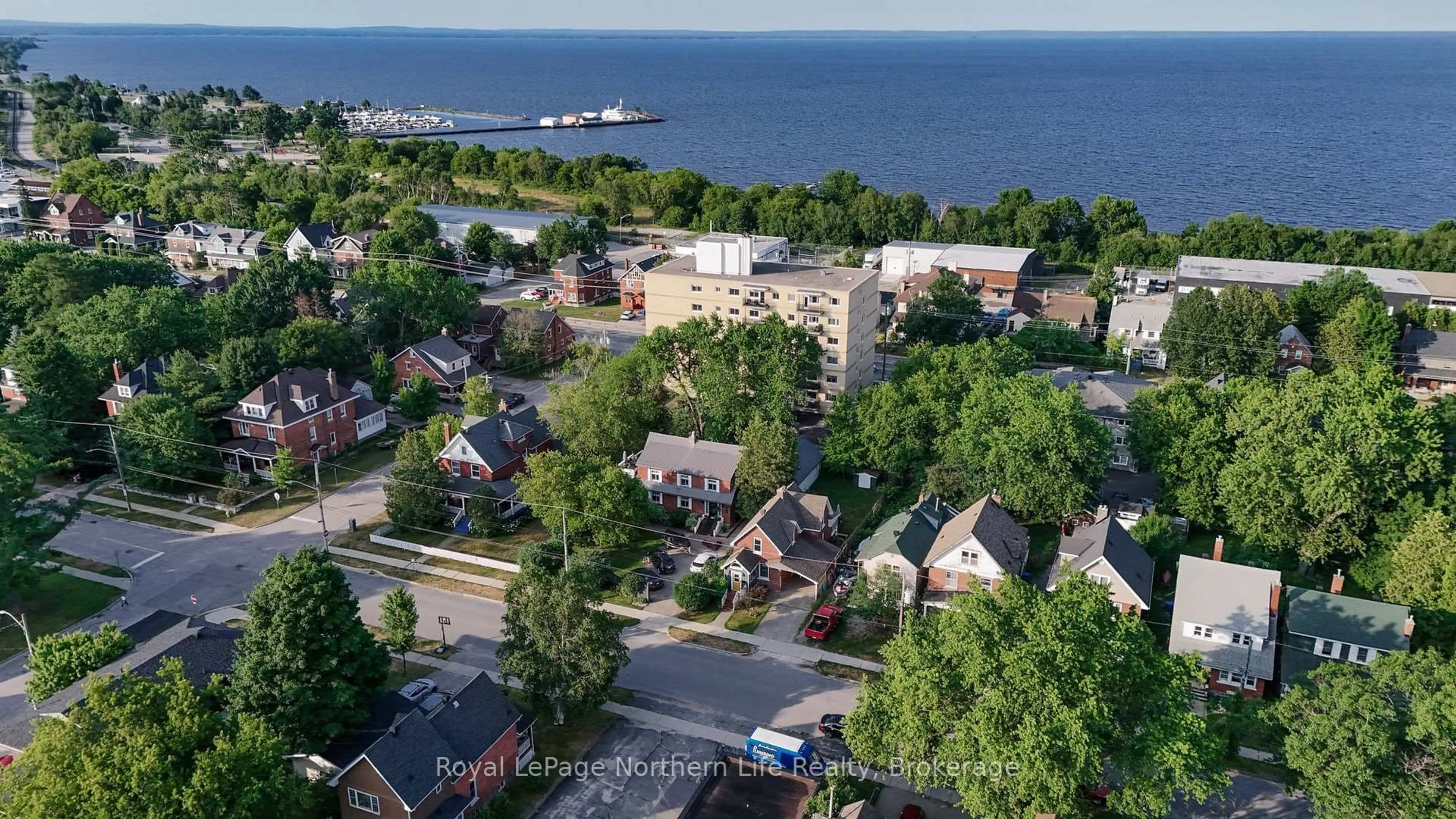 A pic from outside/outdoor area/front of a property/back of a property/a pic from drone, water/lake/river/ocean view for 833 McIntyre St, North Bay Ontario P1B 3A2