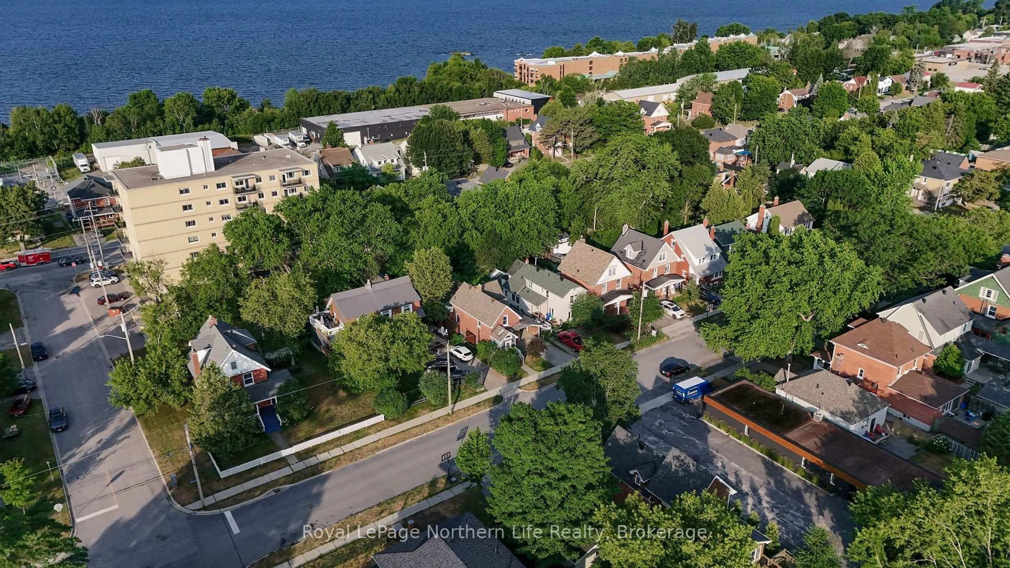 A pic from outside/outdoor area/front of a property/back of a property/a pic from drone, water/lake/river/ocean view for 833 McIntyre St, North Bay Ontario P1B 3A2