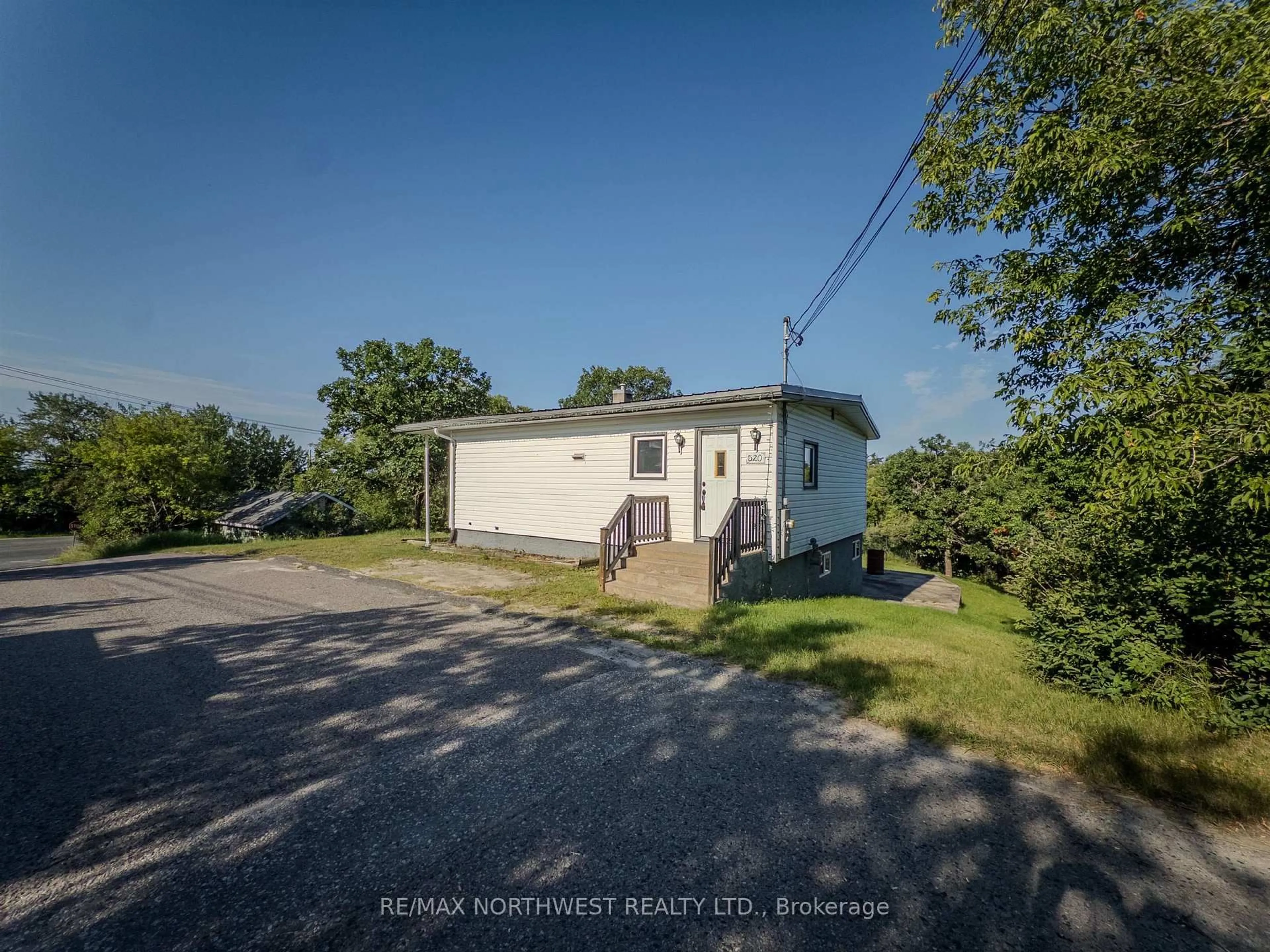 A pic from outside/outdoor area/front of a property/back of a property/a pic from drone, street for 520 Portage Street, Kenora Ontario P0X 1C0