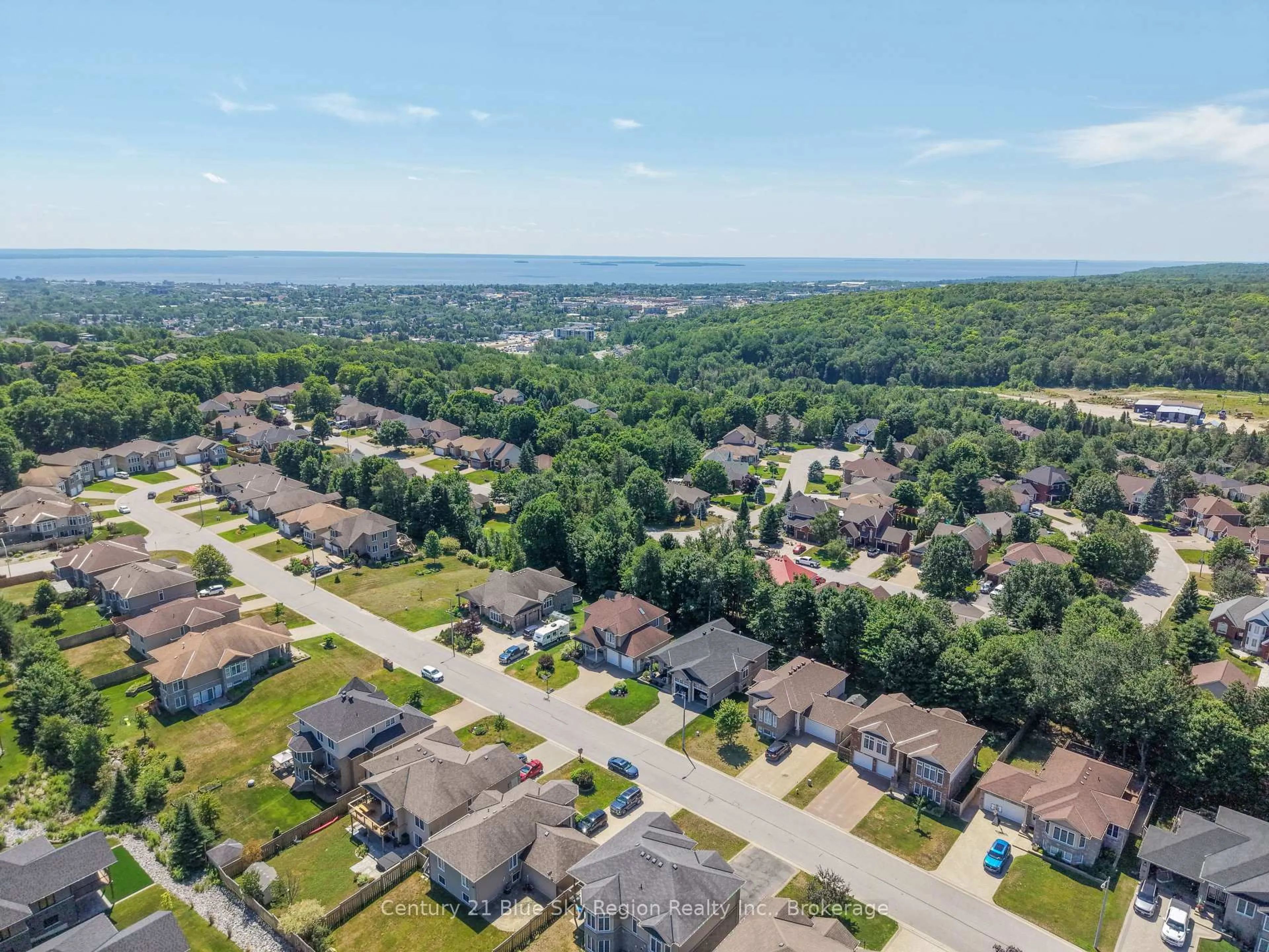 A pic from outside/outdoor area/front of a property/back of a property/a pic from drone, water/lake/river/ocean view for 21 Stone Manor Dr, North Bay Ontario P1C 0A2