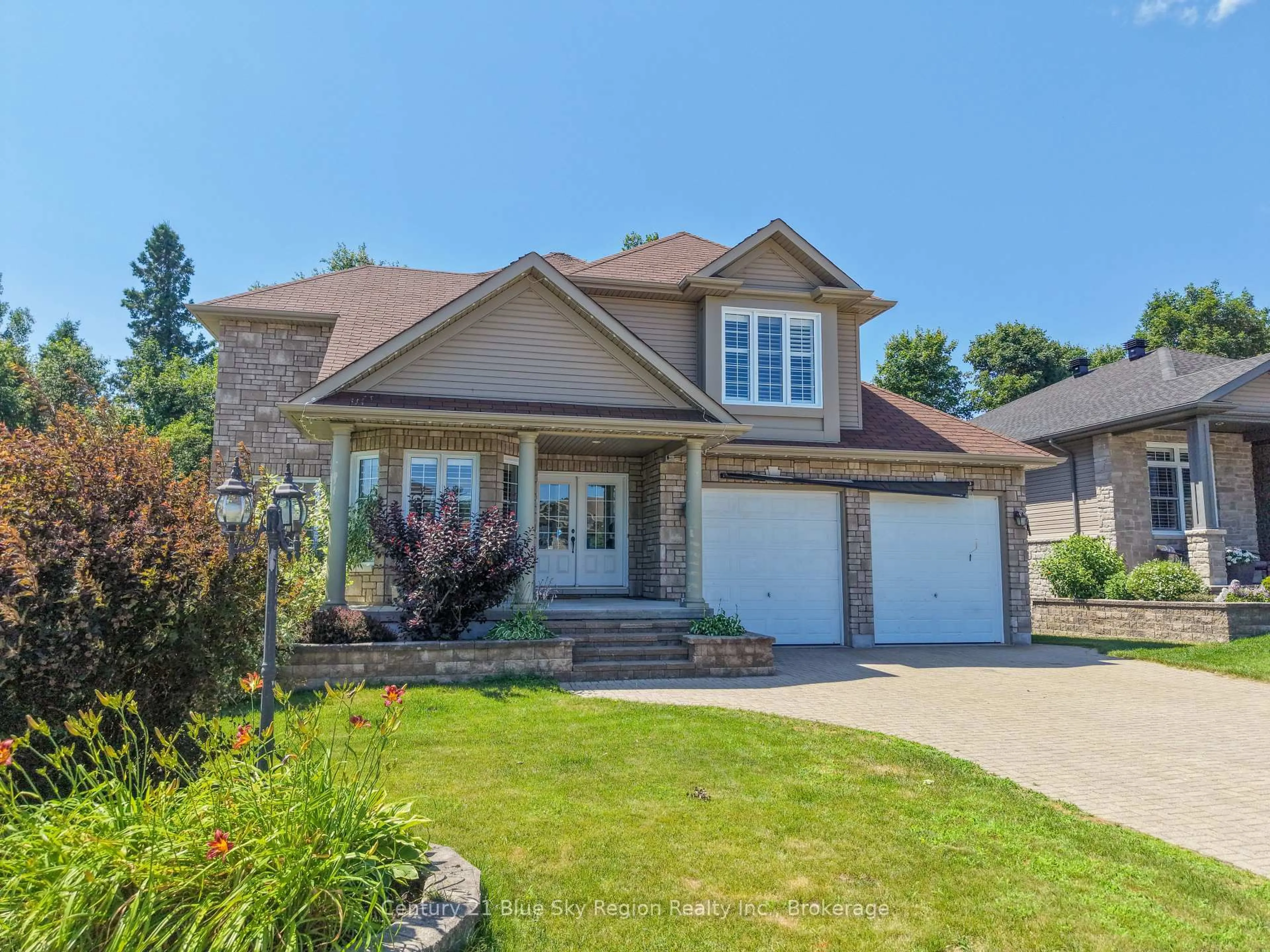 Home with brick exterior material, street for 21 Stone Manor Dr, North Bay Ontario P1C 0A2
