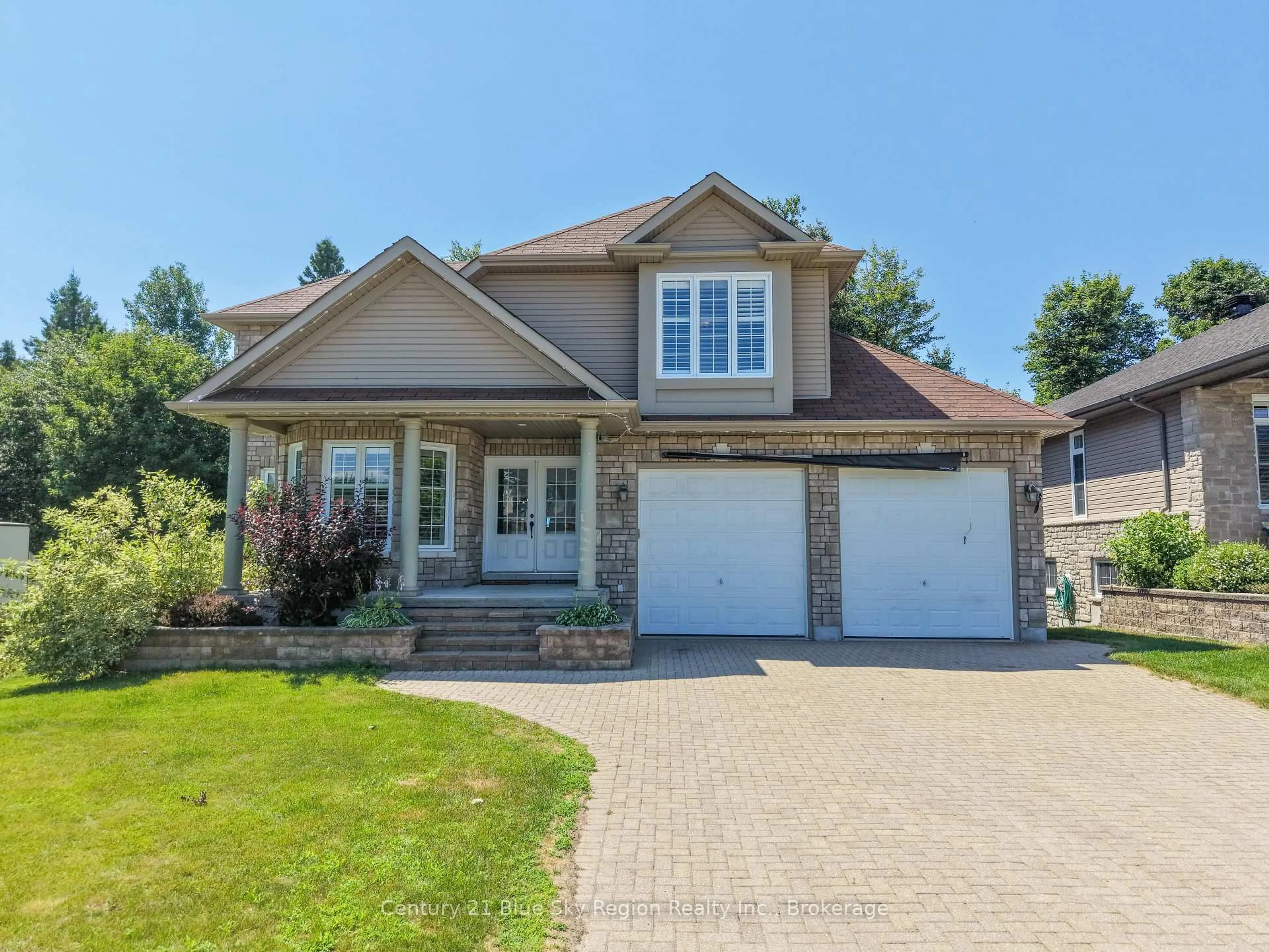 Home with brick exterior material, street for 21 Stone Manor Dr, North Bay Ontario P1C 0A2