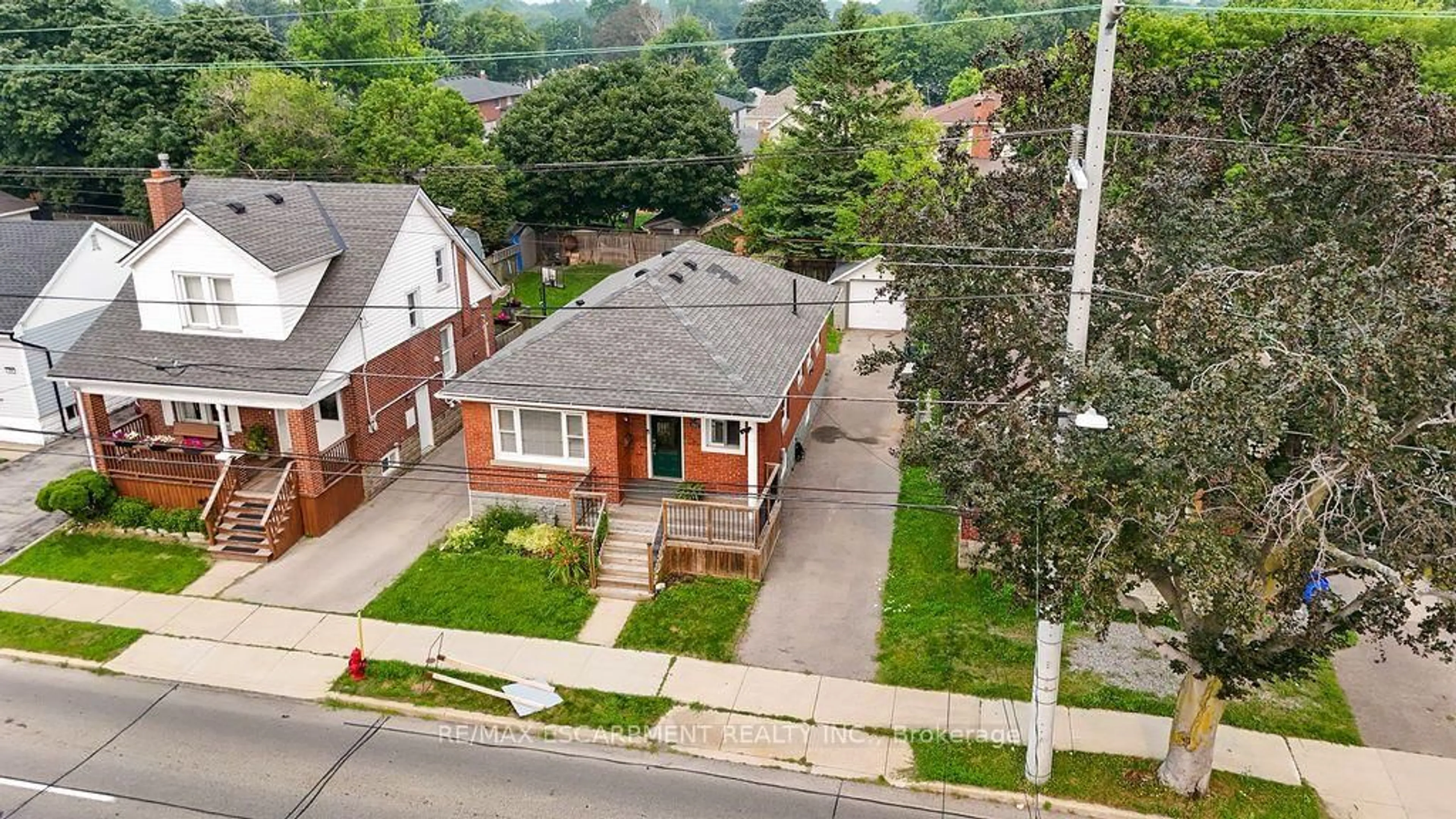 A pic from outside/outdoor area/front of a property/back of a property/a pic from drone, street for 340 Upper Gage Ave, Hamilton Ontario L8V 4H7