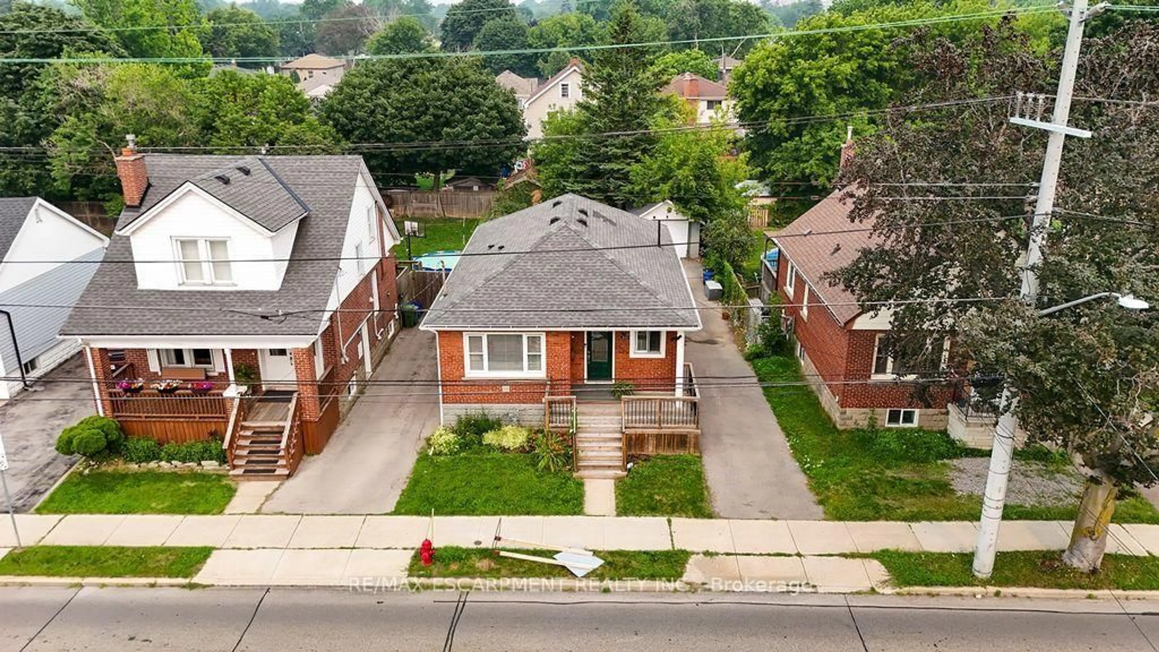 A pic from outside/outdoor area/front of a property/back of a property/a pic from drone, street for 340 Upper Gage Ave, Hamilton Ontario L8V 4H7