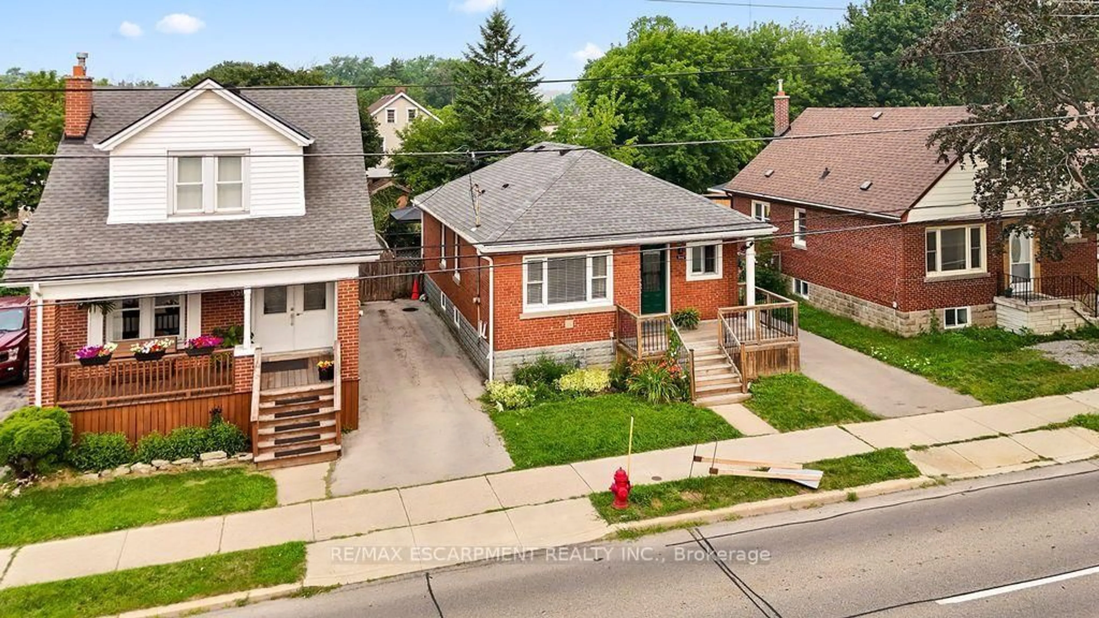 Home with brick exterior material, street for 340 Upper Gage Ave, Hamilton Ontario L8V 4H7