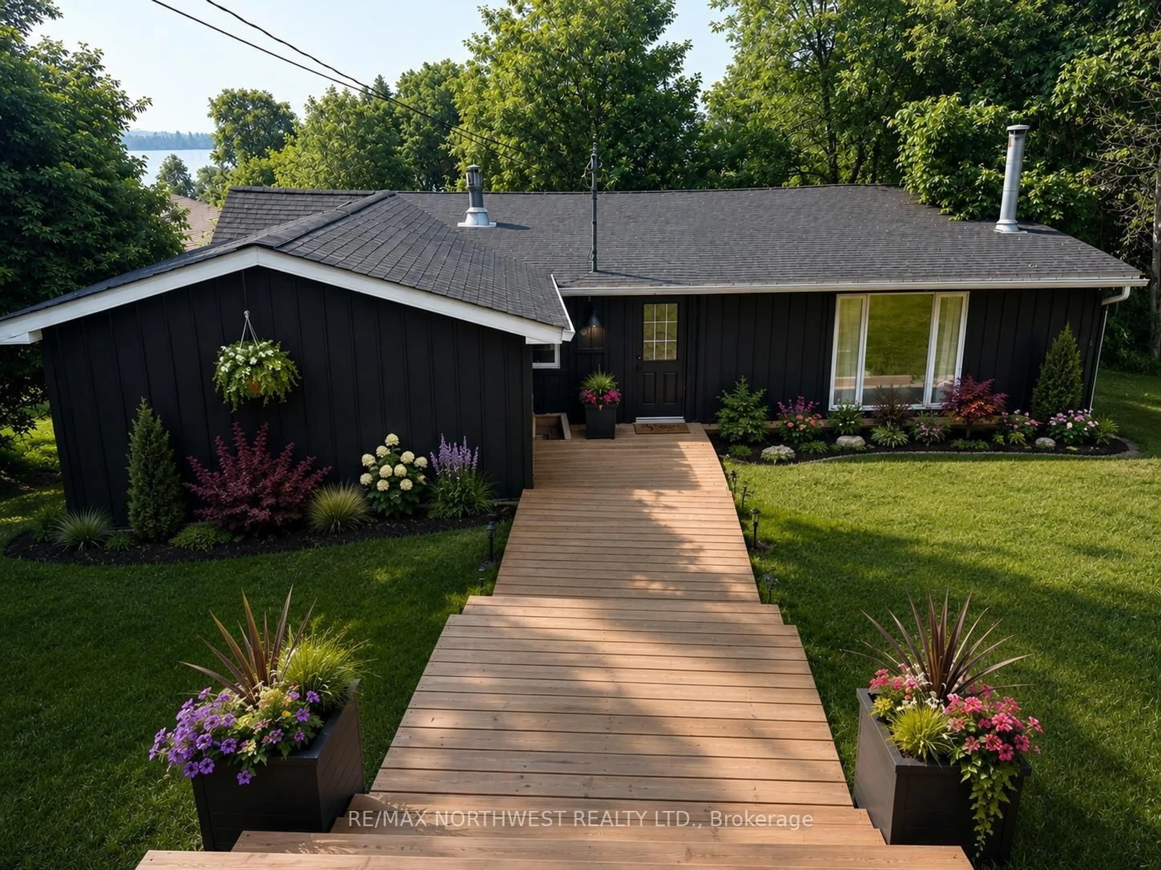 A pic from outside/outdoor area/front of a property/back of a property/a pic from drone, street for 715 St Clair, Kenora Ontario P0X 1C0